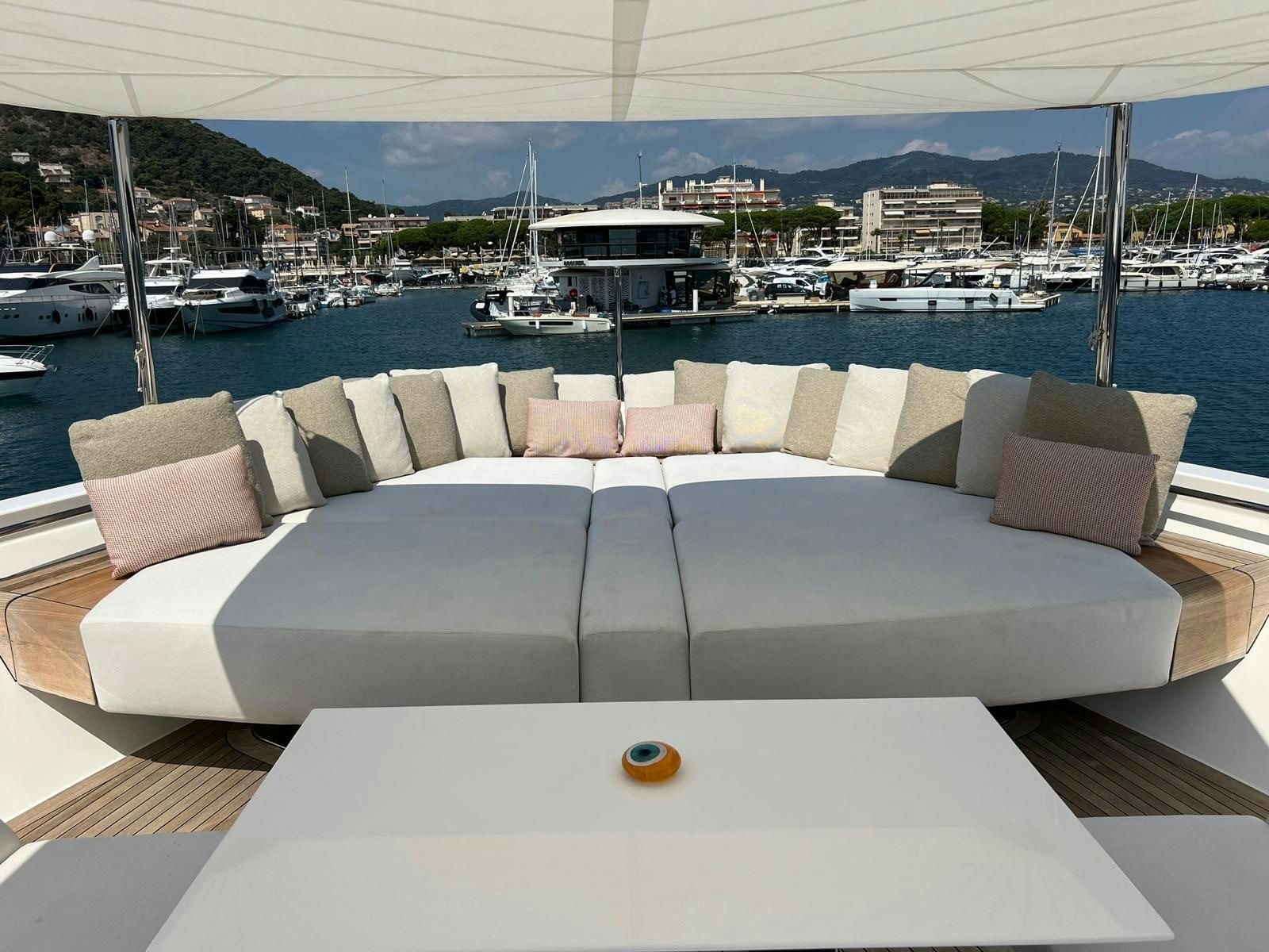 a couch on a boat dock aboard MAREA Yacht for Sale
