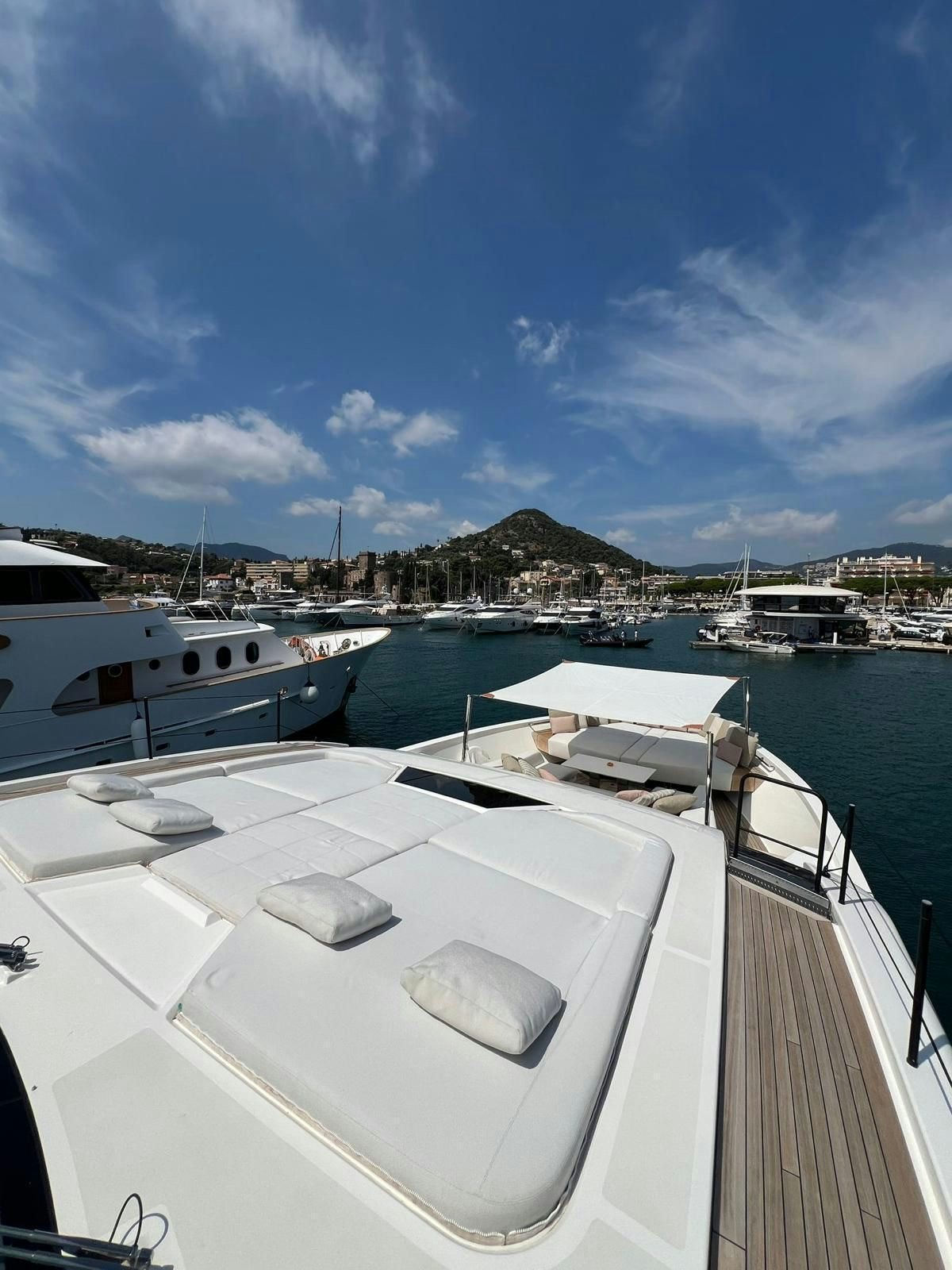 a boat is parked on the side of the water aboard MAREA Yacht for Sale