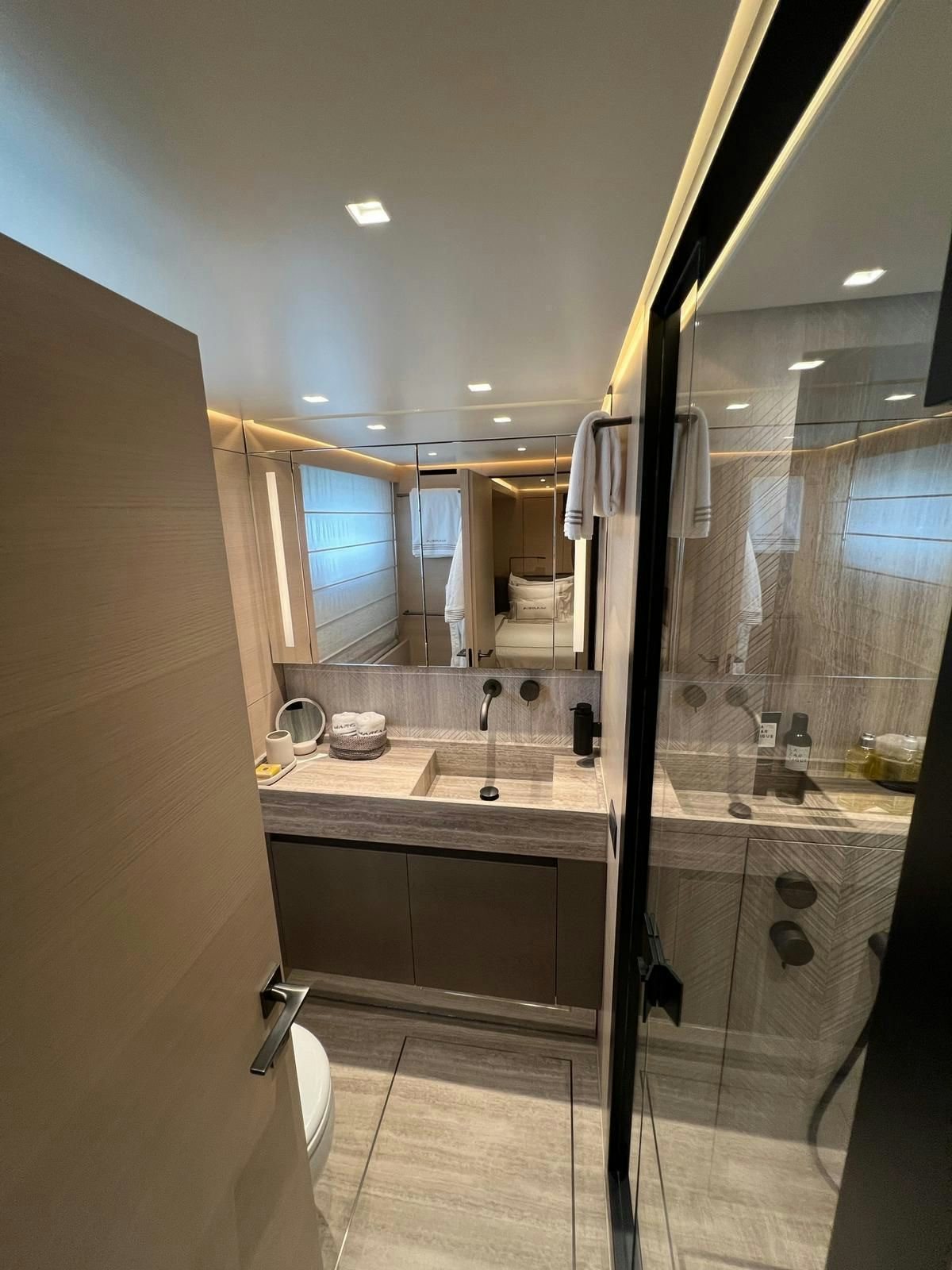 a bathroom with a large mirror aboard MAREA Yacht for Sale