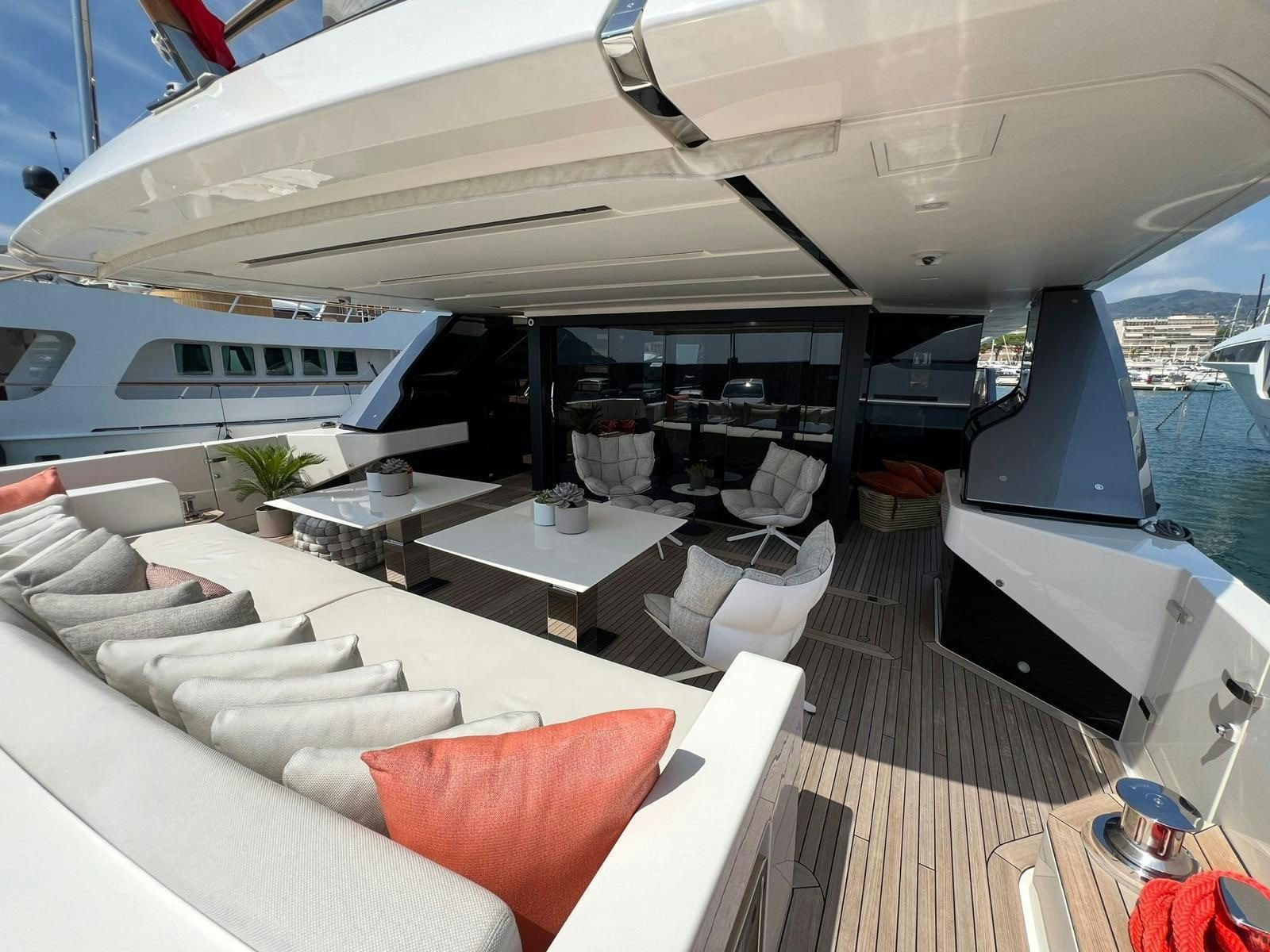 a boat with a couch and a table on it aboard MAREA Yacht for Sale