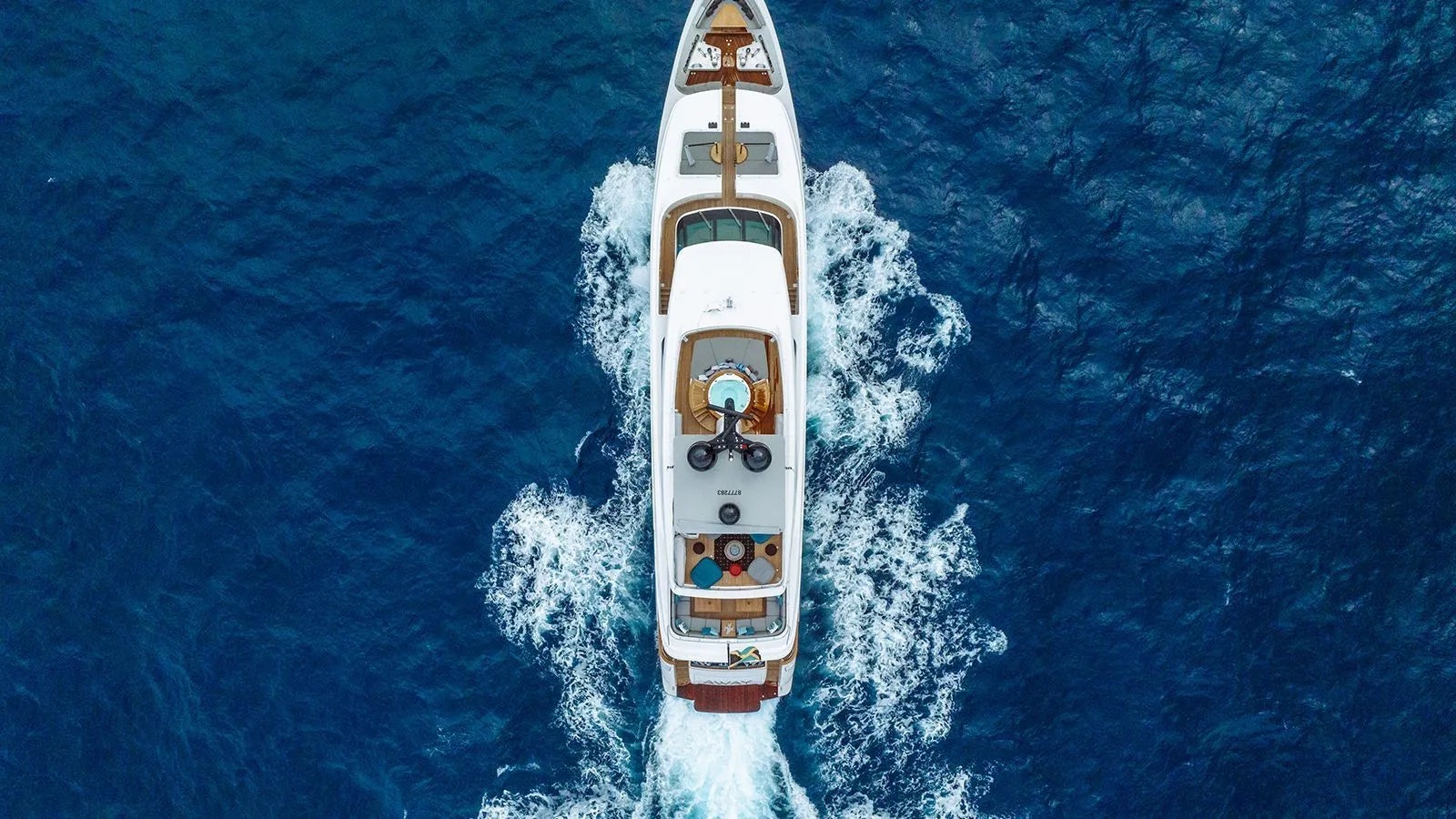 a white ship in the water aboard AWAY Yacht for Charter