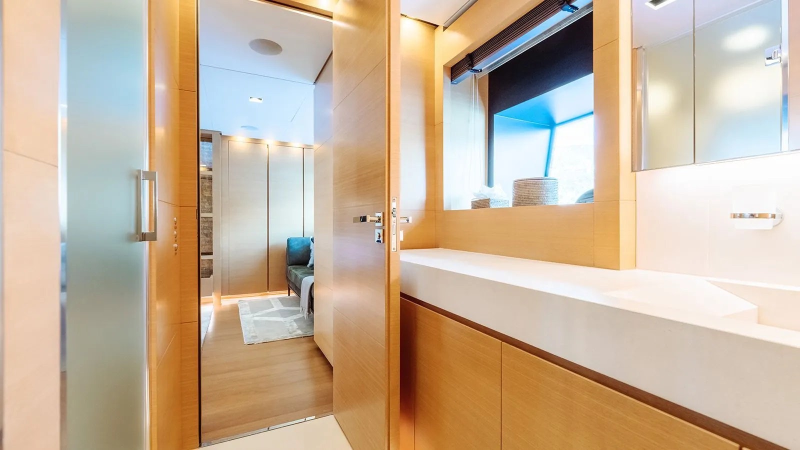 a bathroom with a large window aboard AWAY Yacht for Charter
