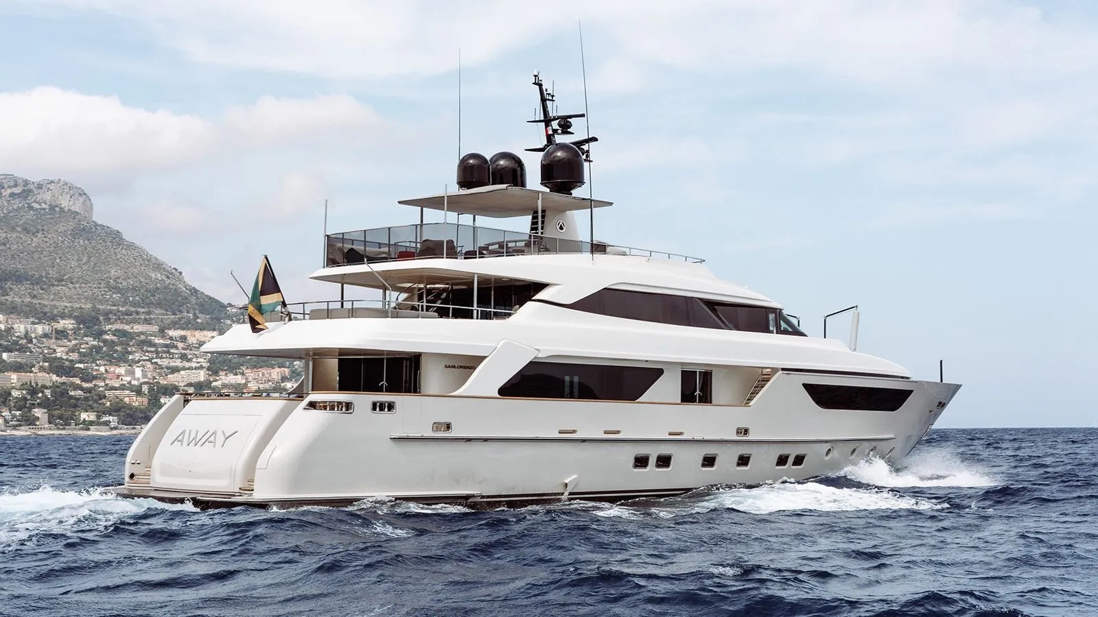 a white yacht on the water aboard AWAY Yacht for Charter