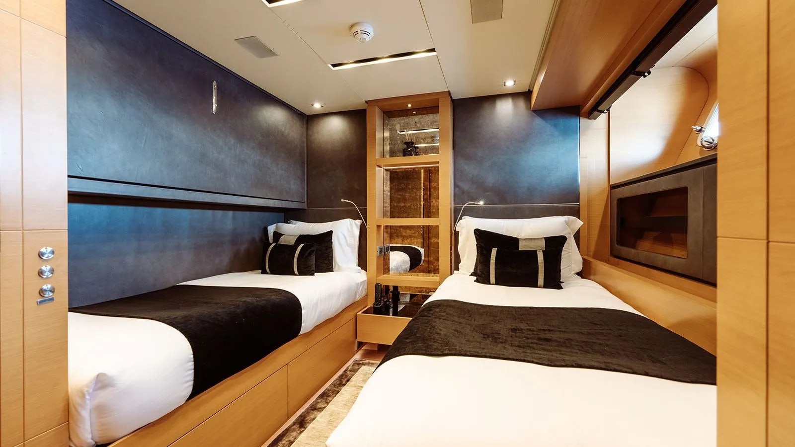 a room with two beds aboard AWAY Yacht for Charter