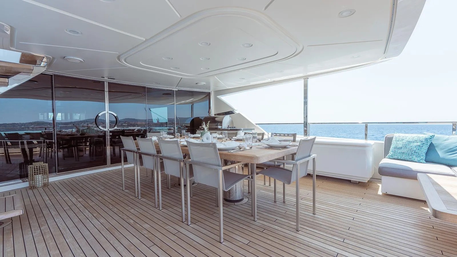 a room with a table and chairs aboard AWAY Yacht for Charter