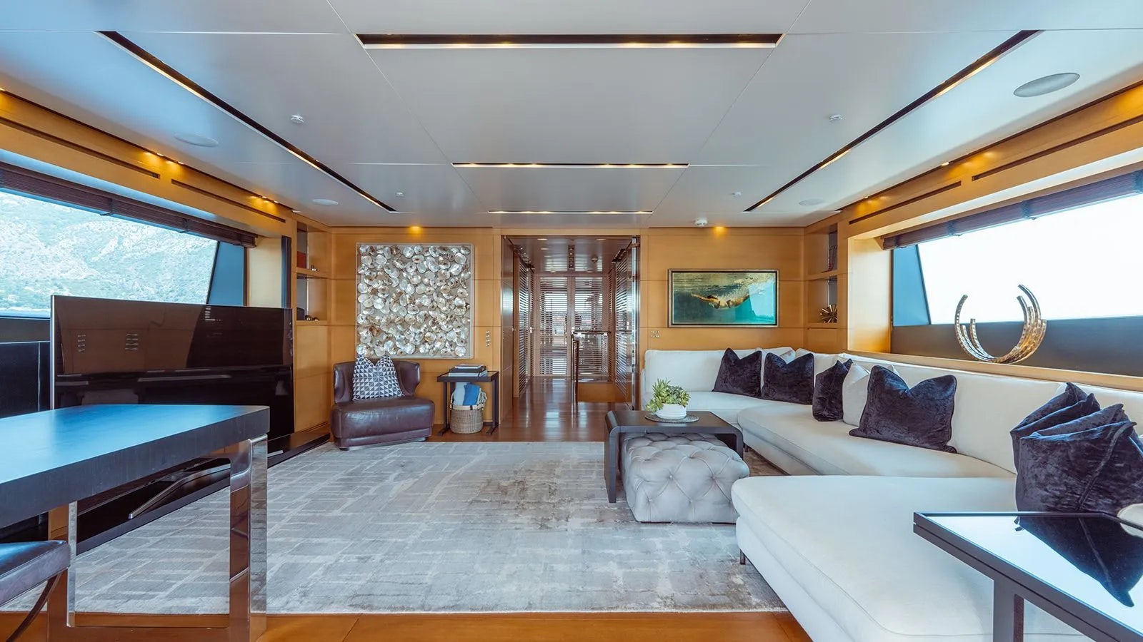 a living room with a large open door aboard AWAY Yacht for Charter
