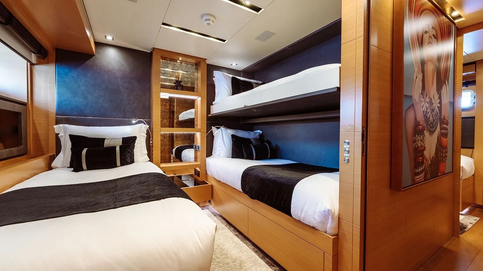 a room with a bed and a closet aboard AWAY Yacht for Charter