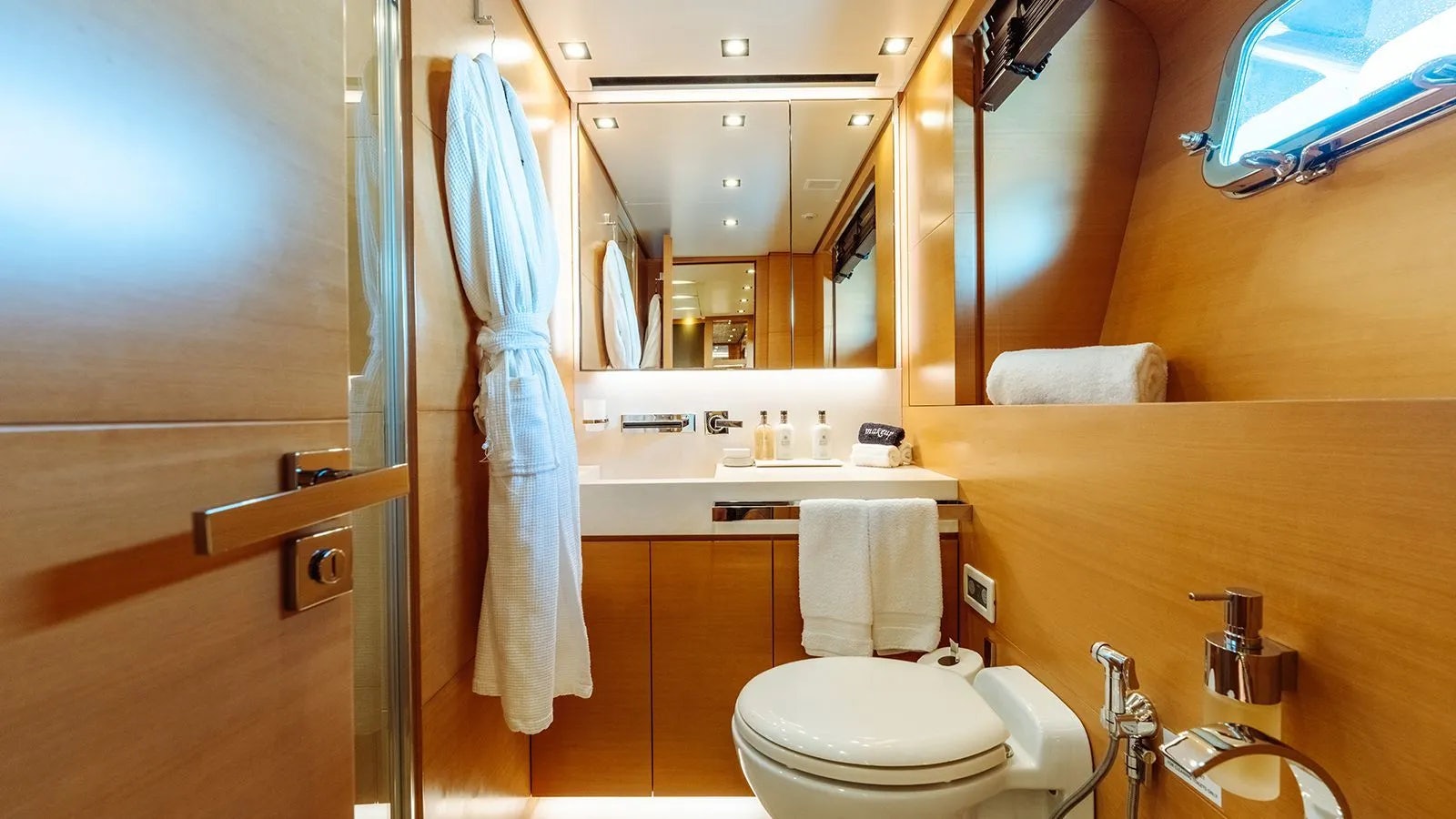 a bathroom with a towel on the wall aboard AWAY Yacht for Charter