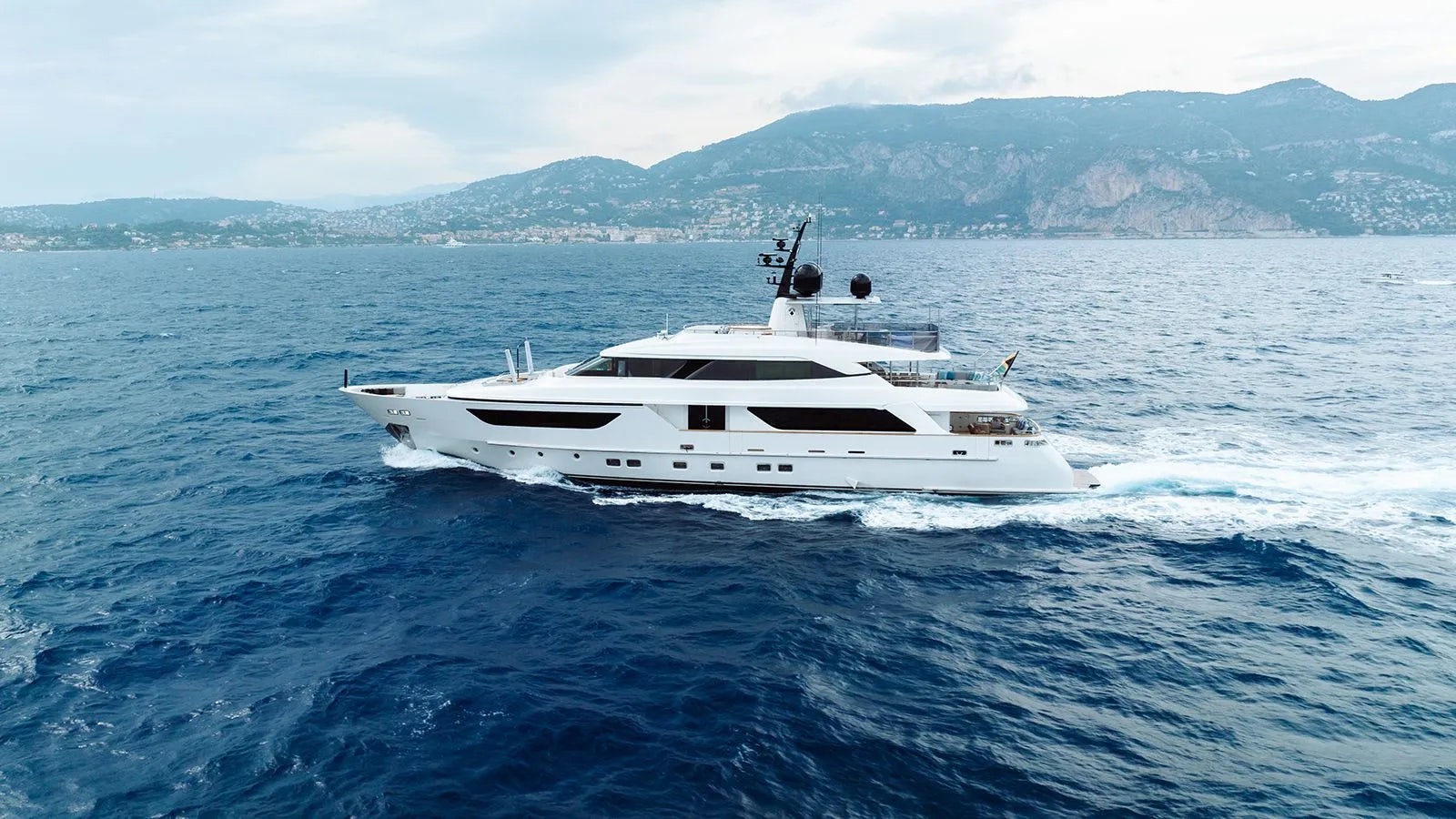 a white yacht in the water aboard AWAY Yacht for Charter