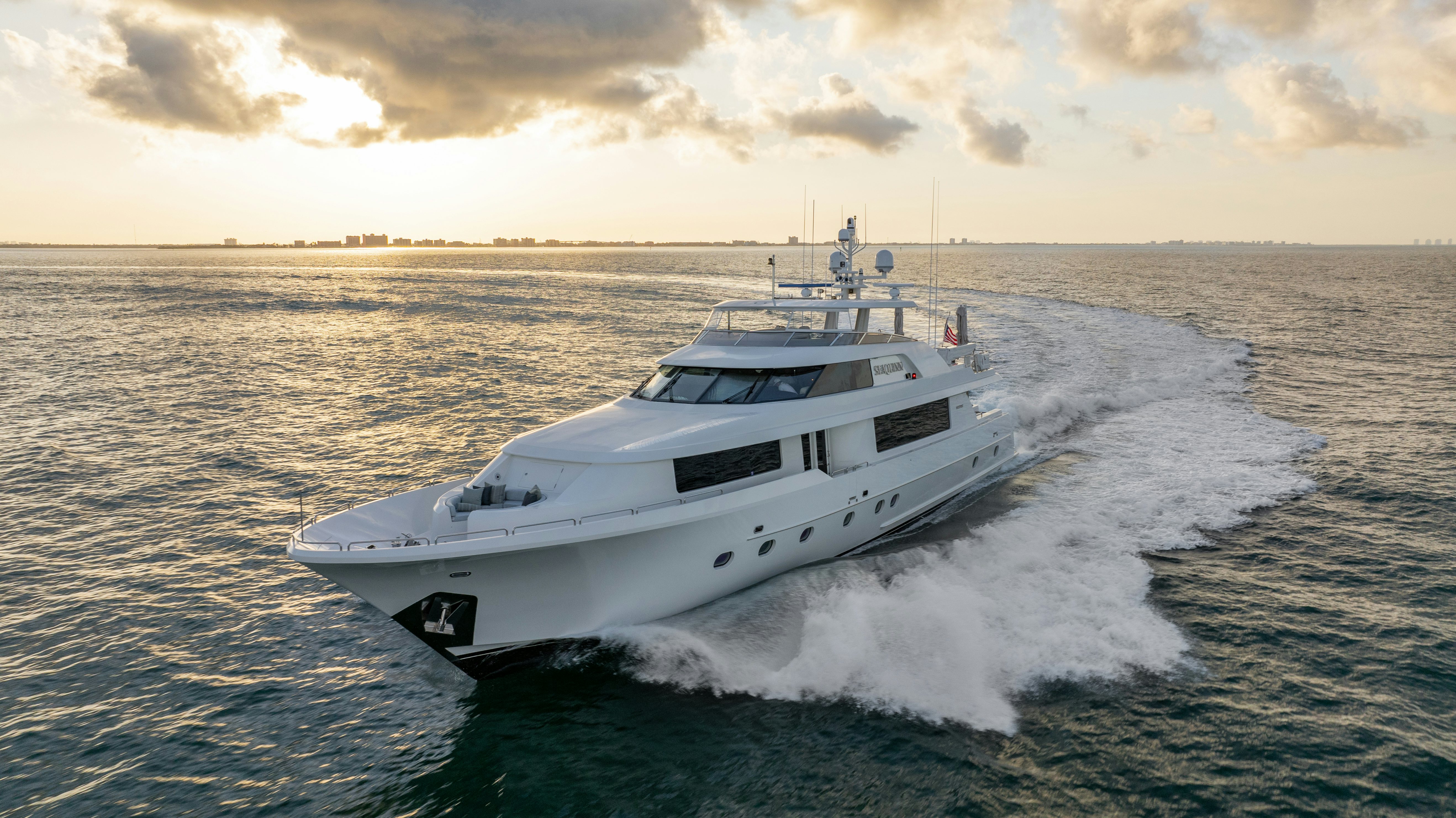 a white boat on the water aboard SEAQUINN Yacht for Sale