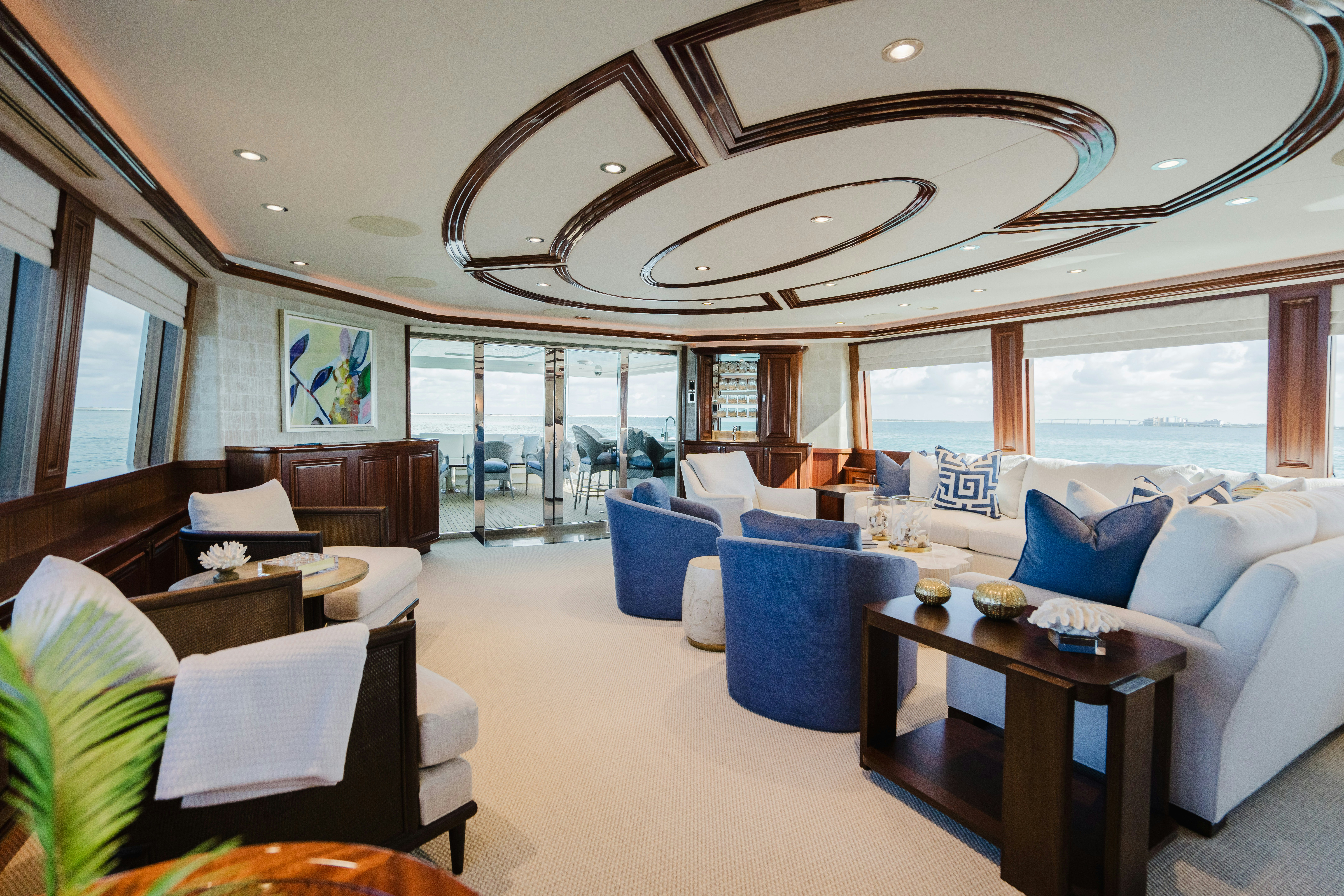 a large living room with a large glass ceiling aboard SEAQUINN Yacht for Sale