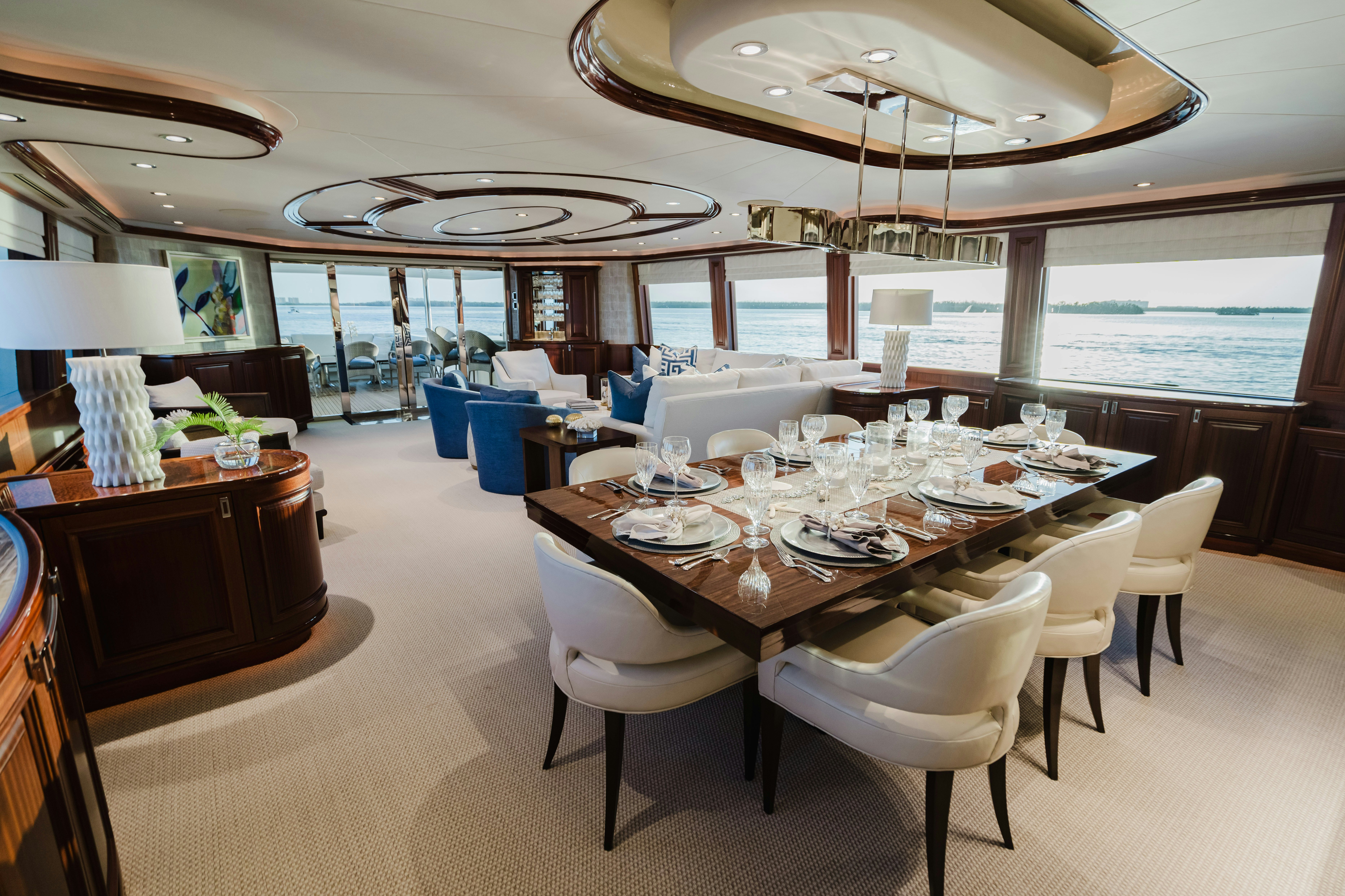 a large dining table in a large room aboard SEAQUINN Yacht for Sale