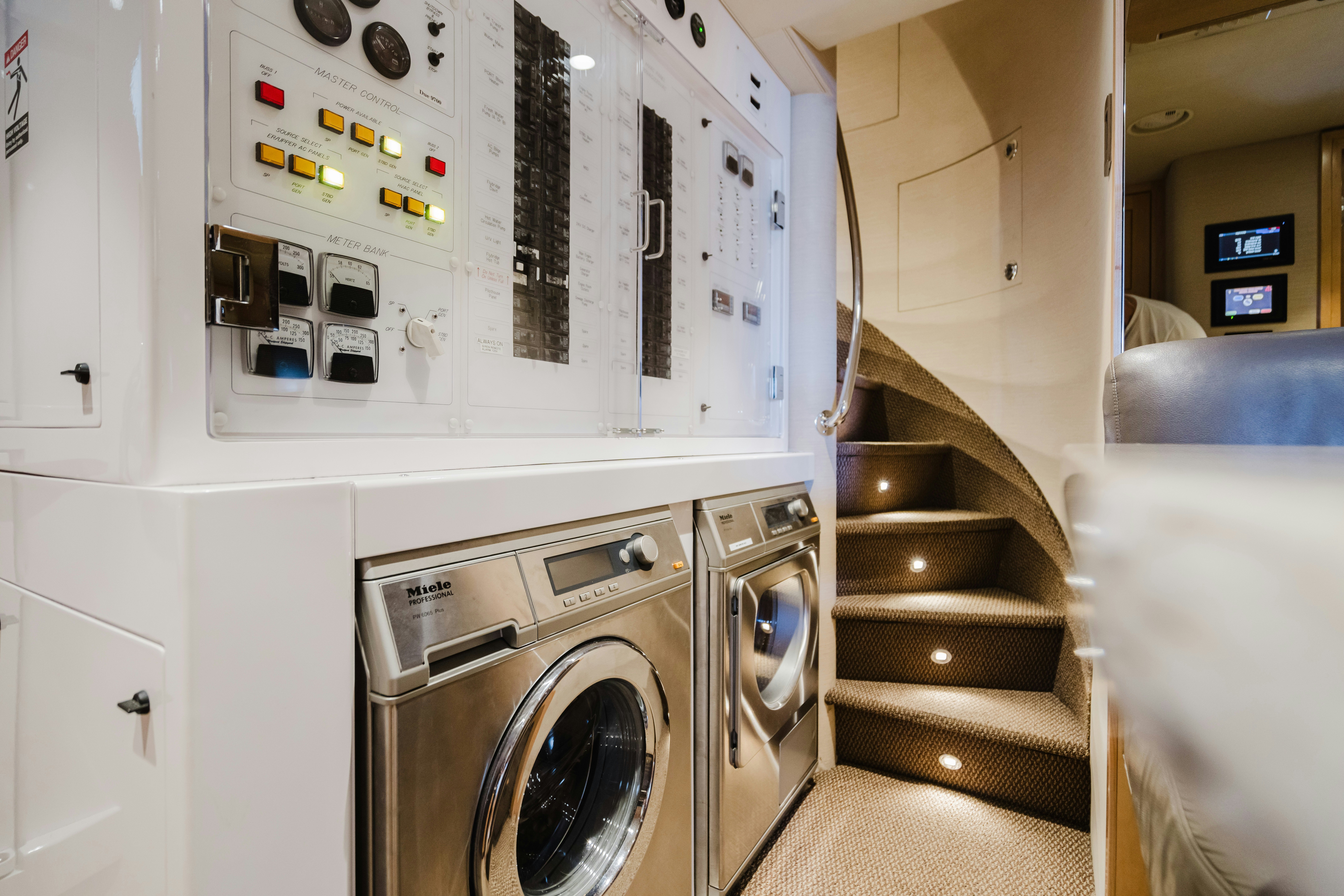 a laundry room with washing machines aboard SEAQUINN Yacht for Sale
