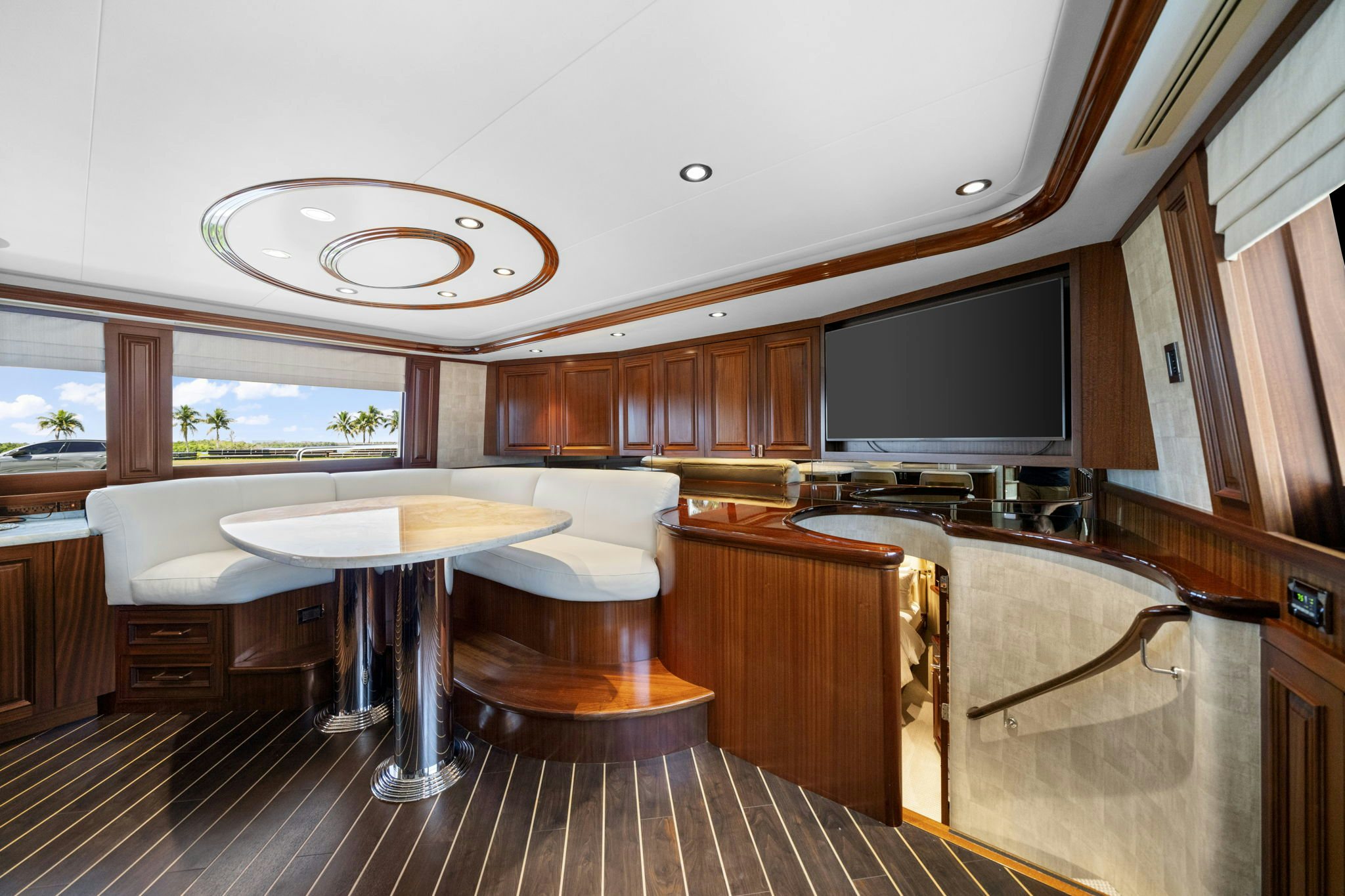 a kitchen with wooden cabinets aboard SEAQUINN Yacht for Sale
