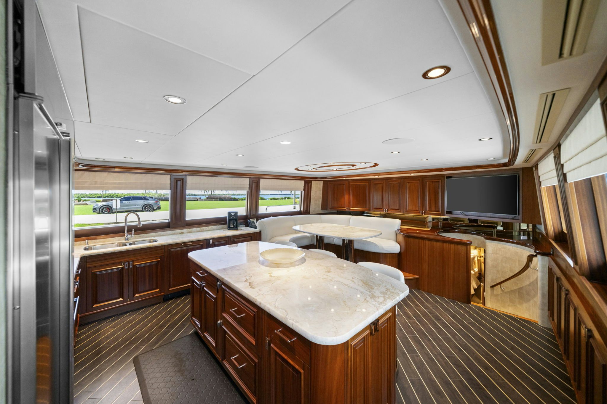 a large kitchen with a large island aboard SEAQUINN Yacht for Sale