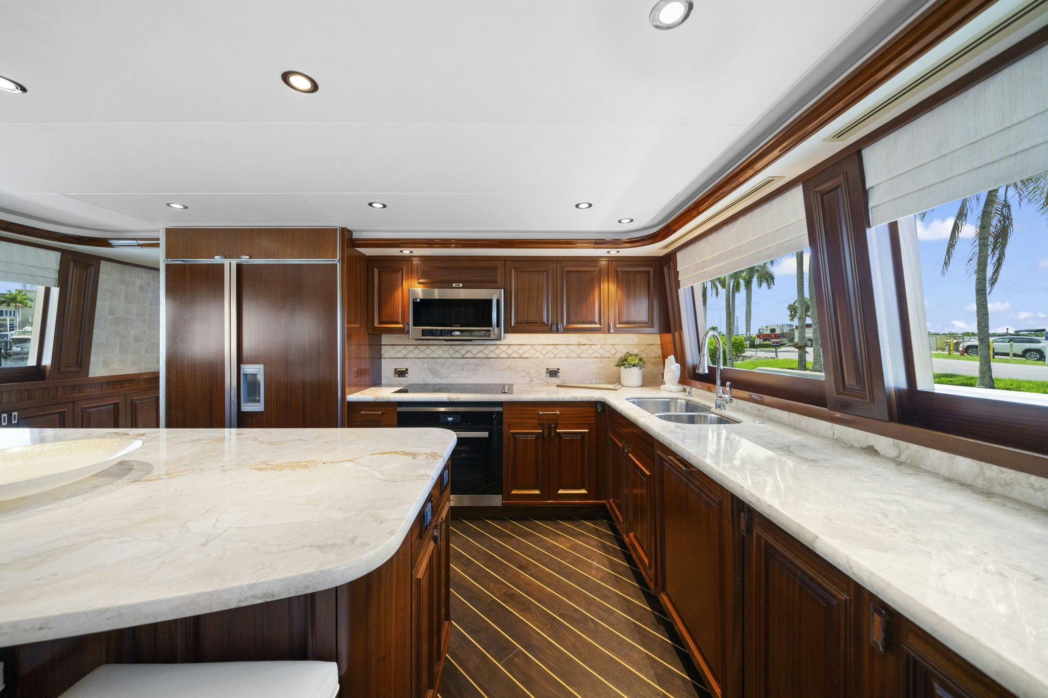 a kitchen with a large island aboard SEAQUINN Yacht for Sale