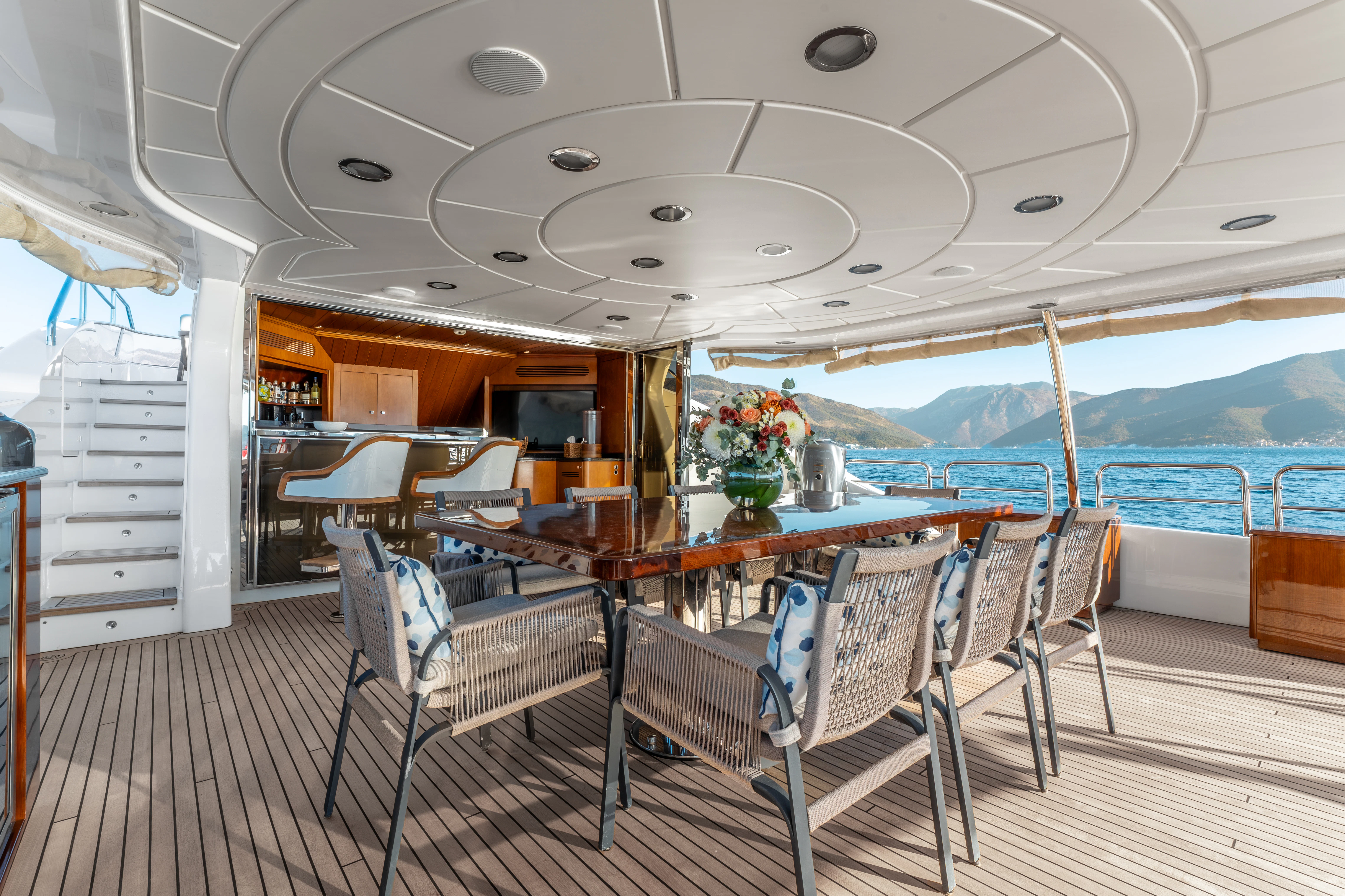 a boat with tables and chairs aboard ARTEMIS Yacht for Sale