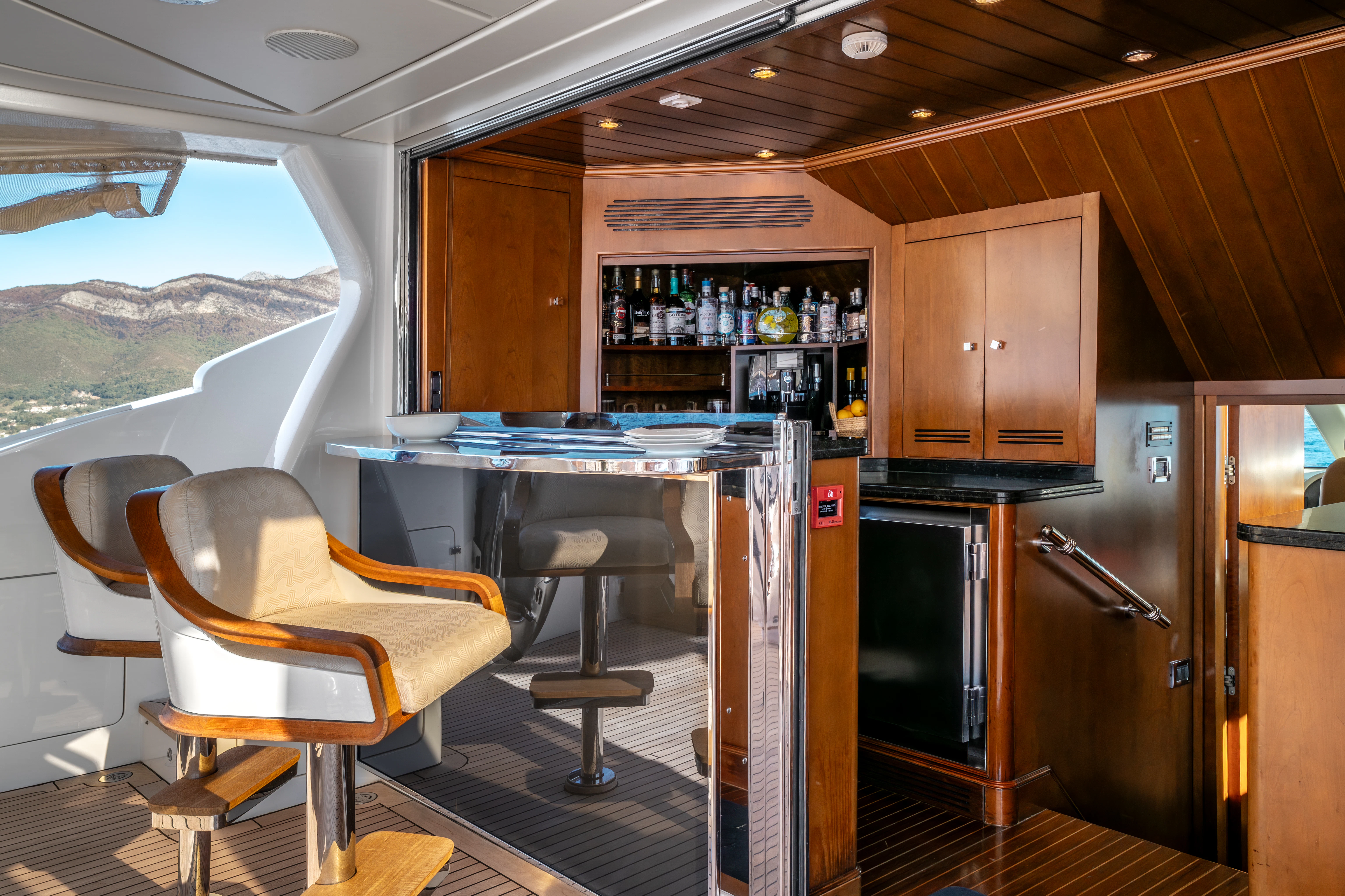a kitchen with a bar and a bar aboard ARTEMIS Yacht for Sale