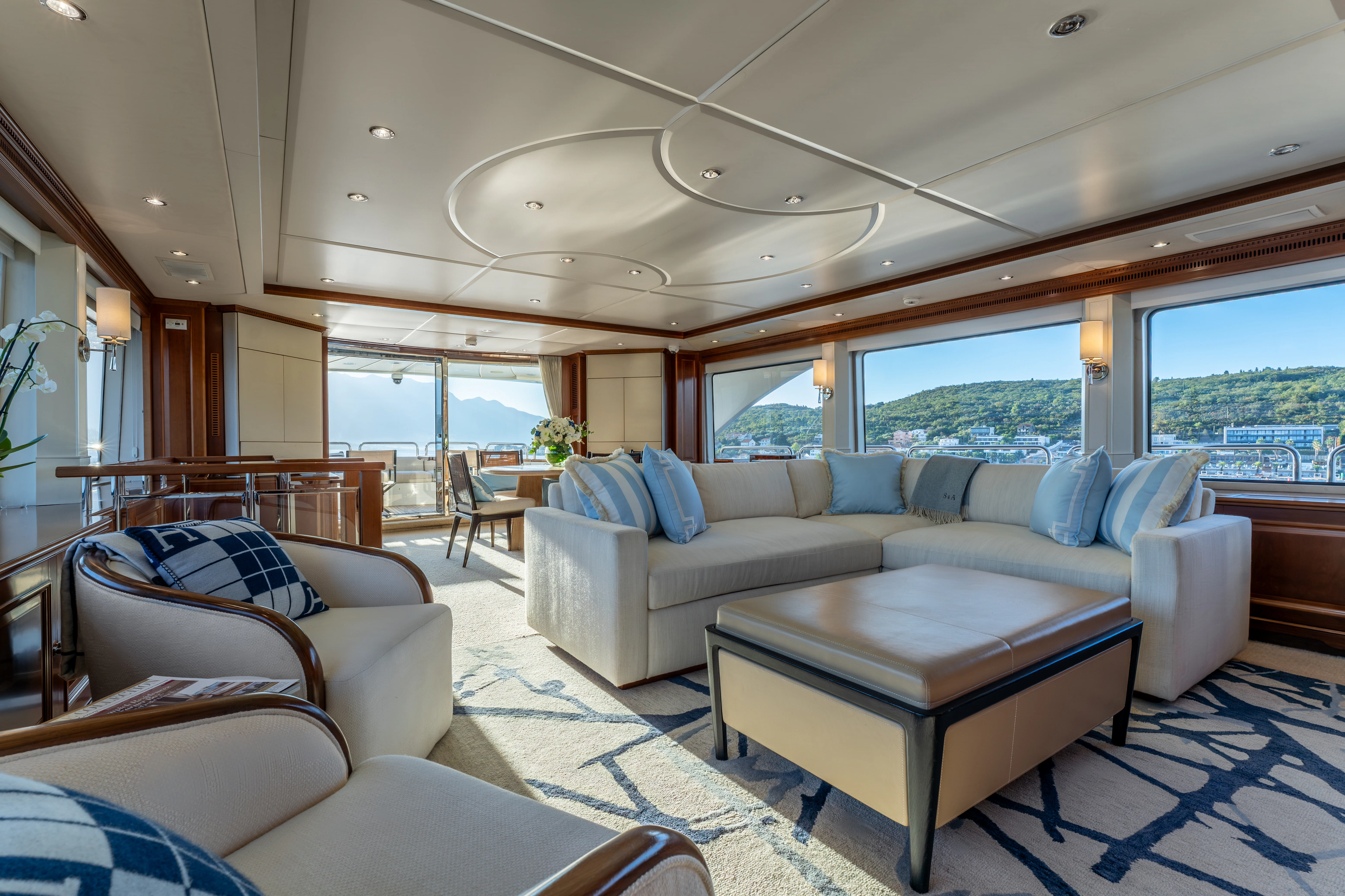 a living room with a large window aboard ARTEMIS Yacht for Sale