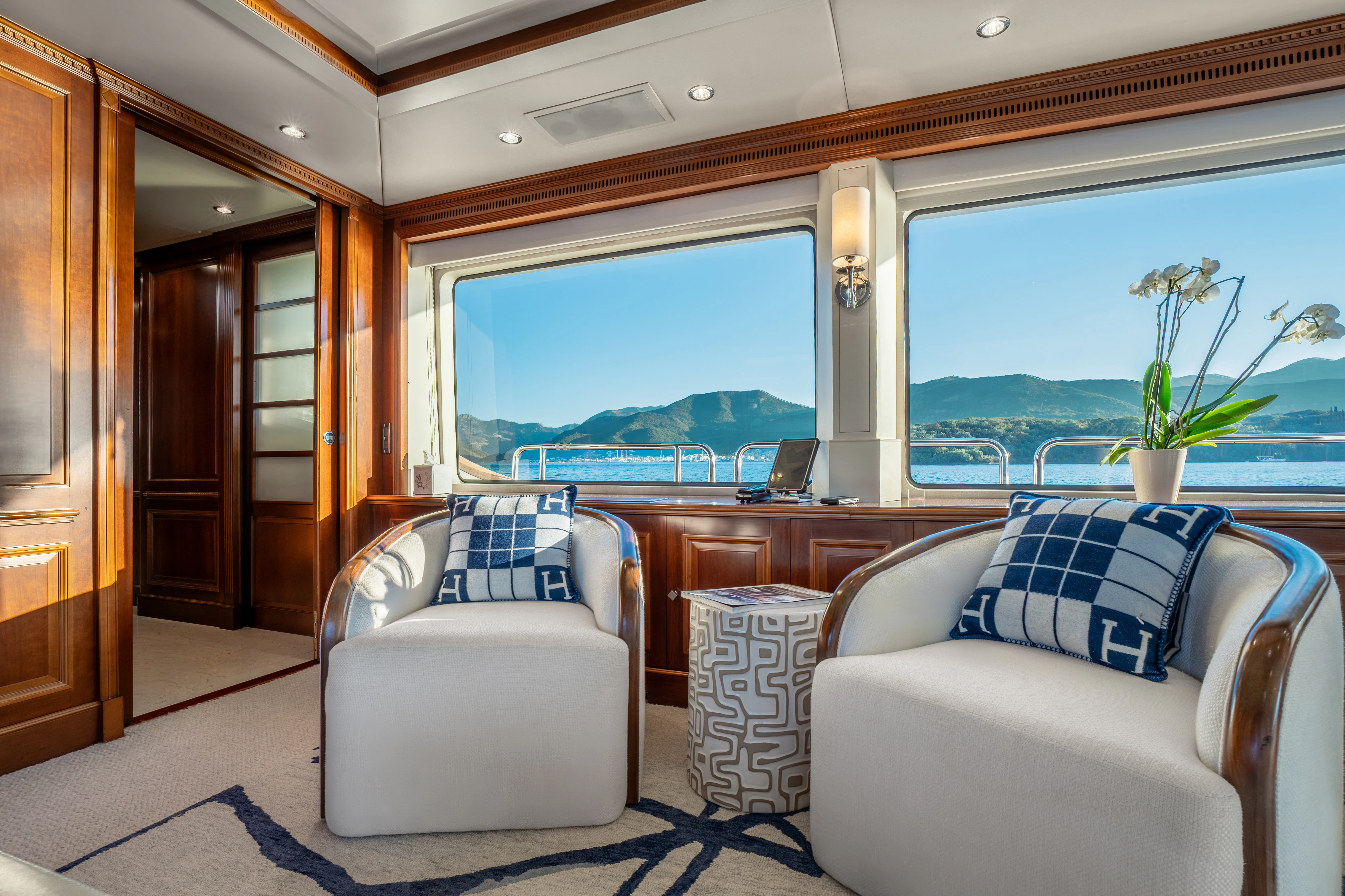 a living room with a large window aboard ARTEMIS Yacht for Sale