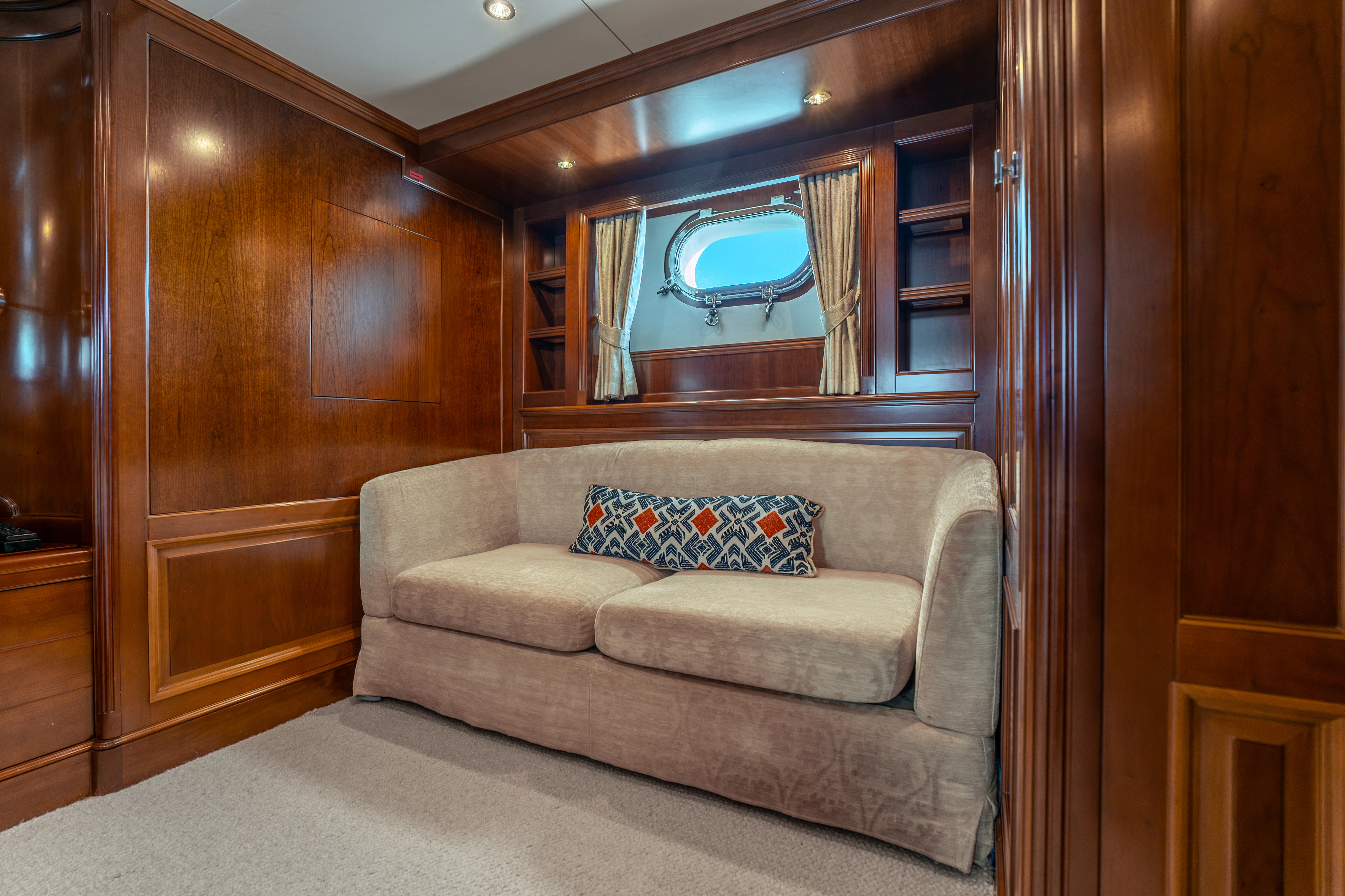 a couch in a room aboard ARTEMIS Yacht for Sale
