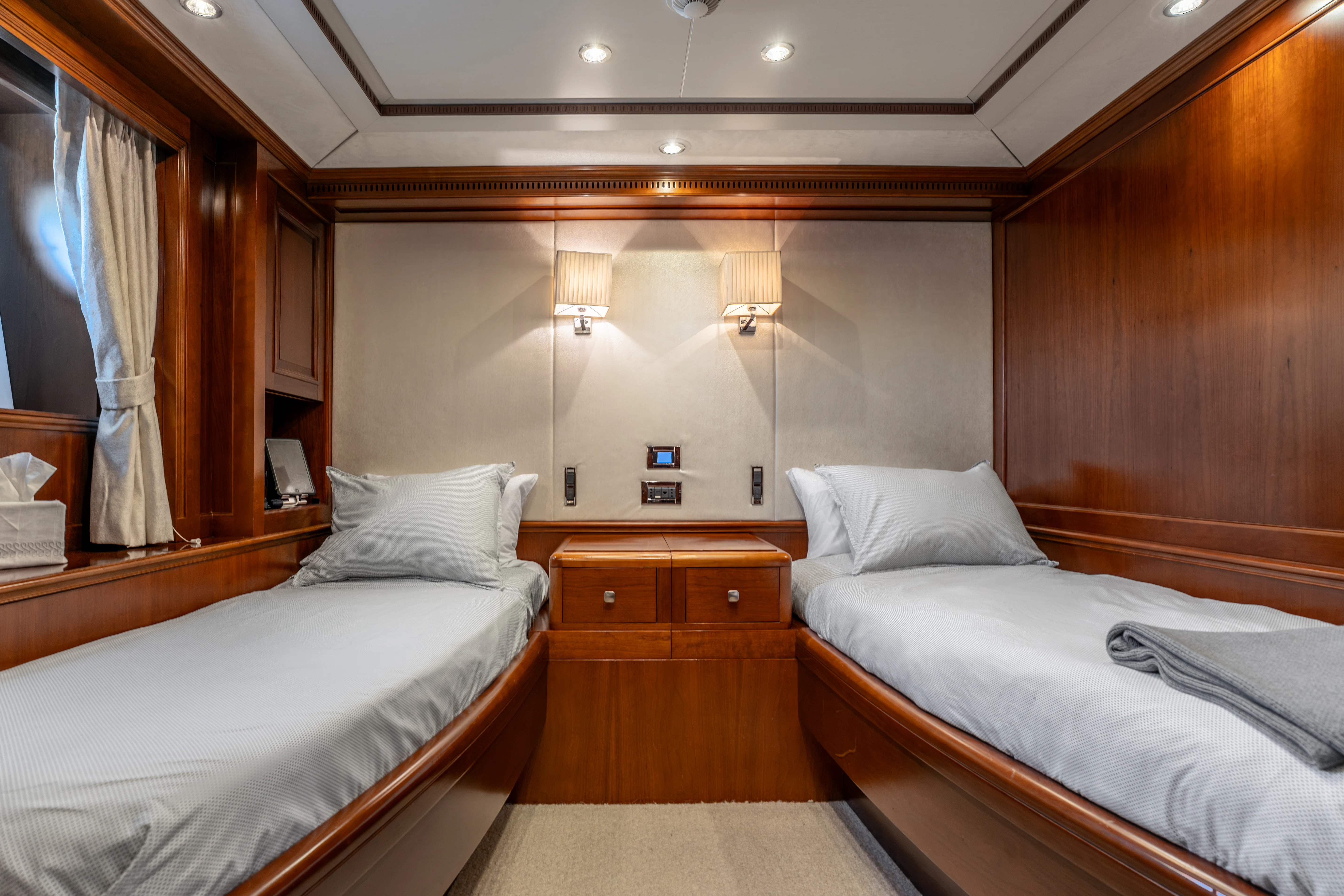 a room with two beds aboard ARTEMIS Yacht for Sale