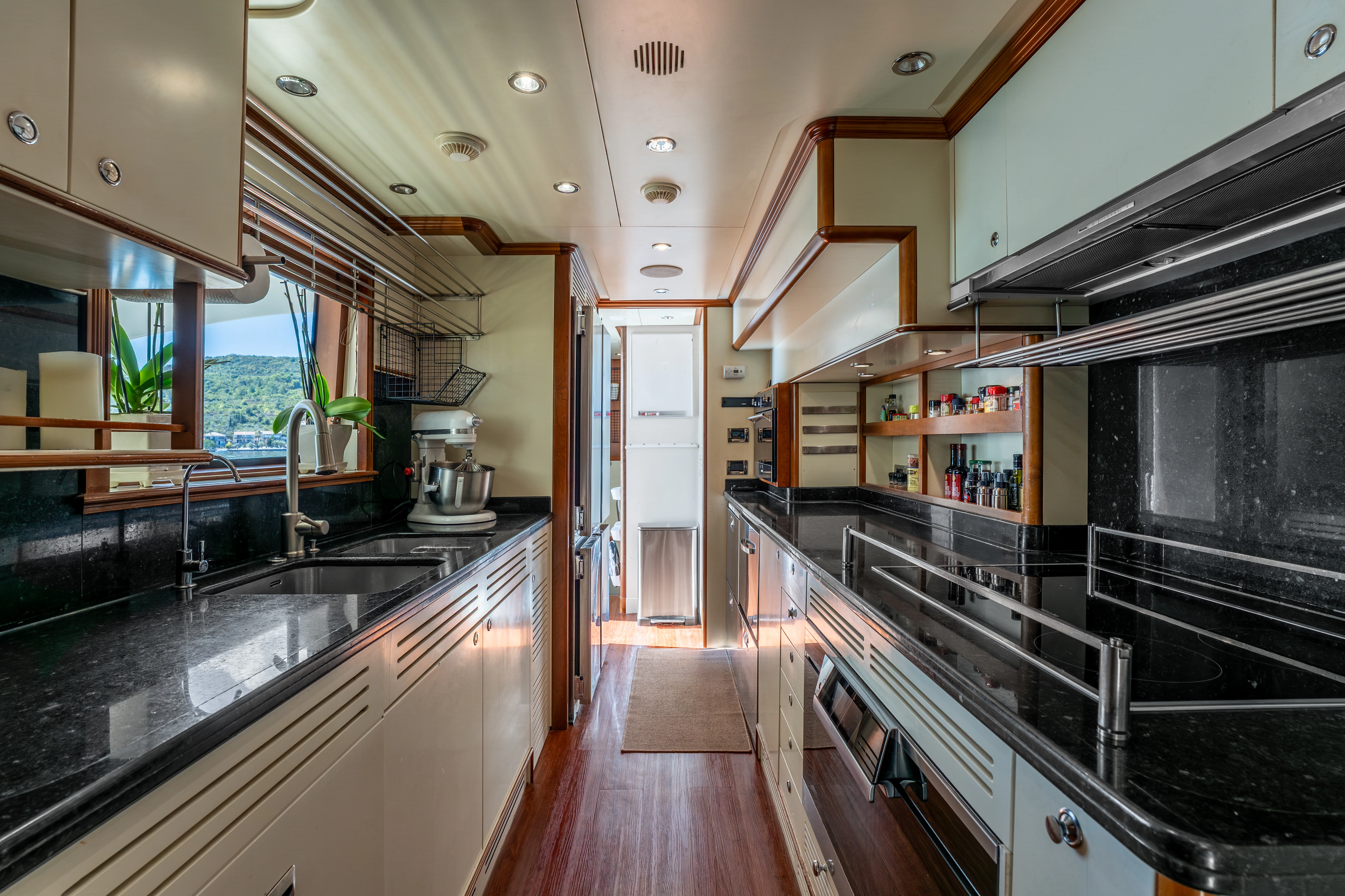 a kitchen with a large island aboard ARTEMIS Yacht for Sale