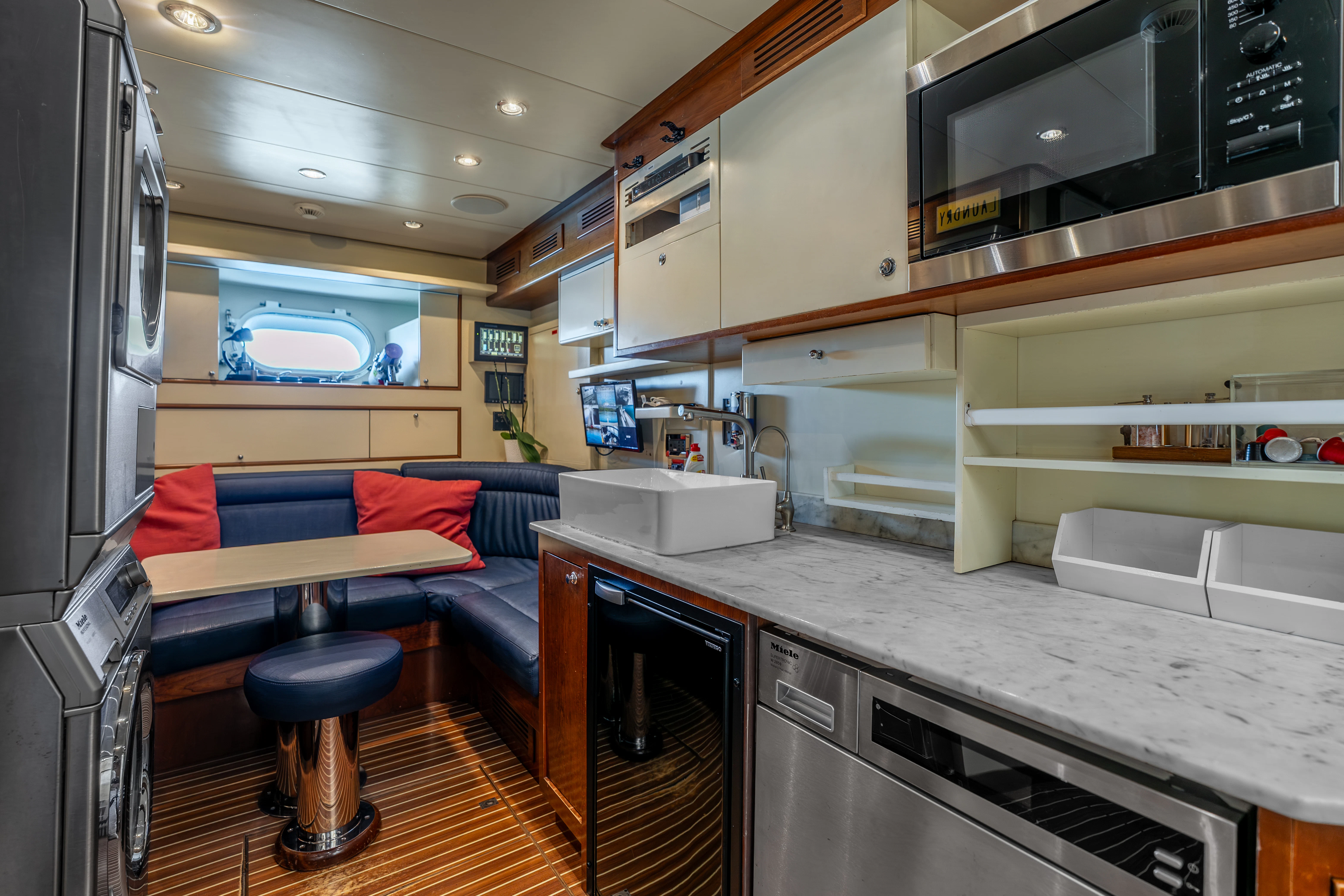 a kitchen and living room aboard ARTEMIS Yacht for Sale