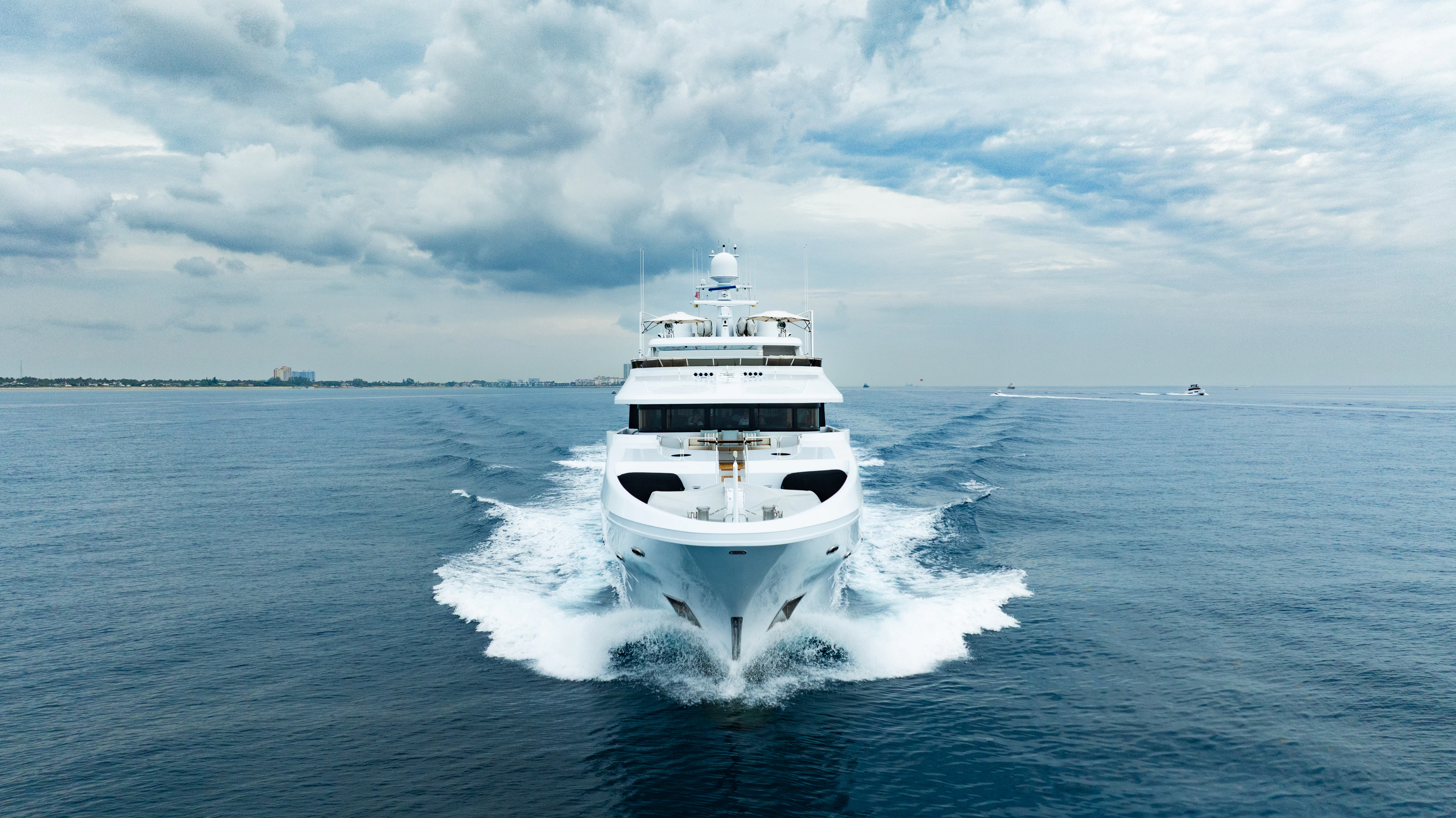 a white yacht on the water aboard SILVER LINING Yacht for Sale