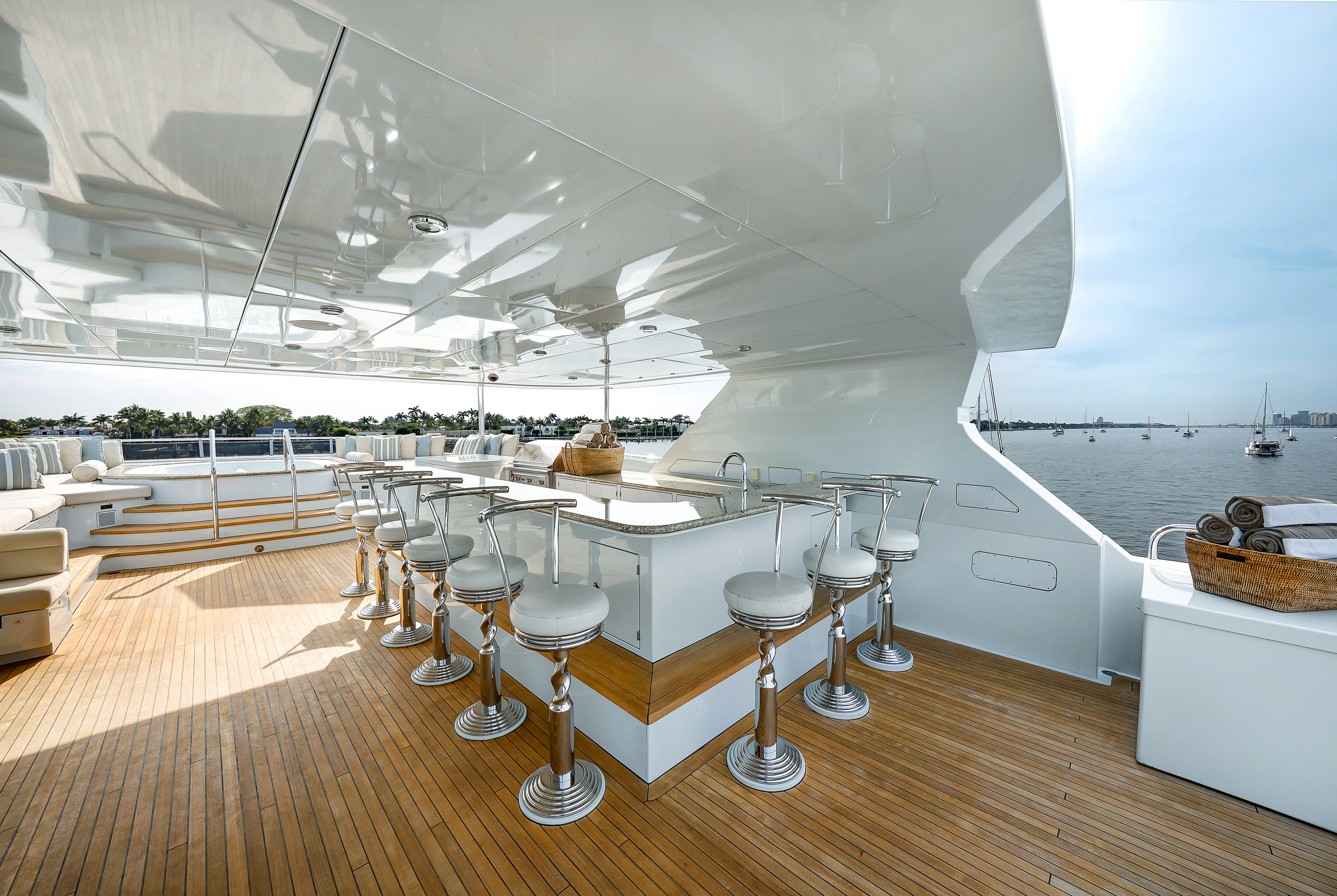 a room with tables and chairs aboard SILVER LINING Yacht for Sale