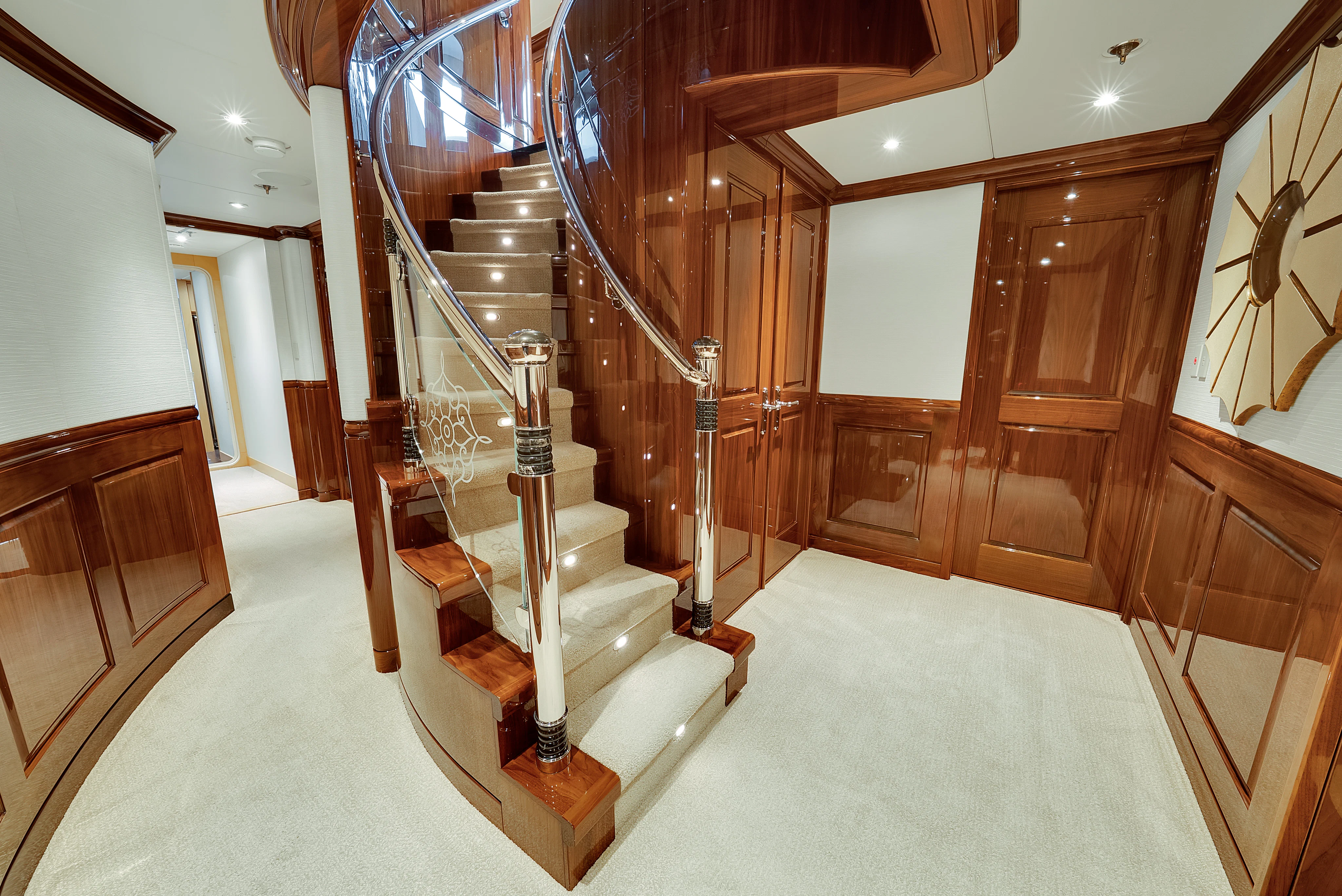 a wooden staircase in a house aboard SILVER LINING Yacht for Sale