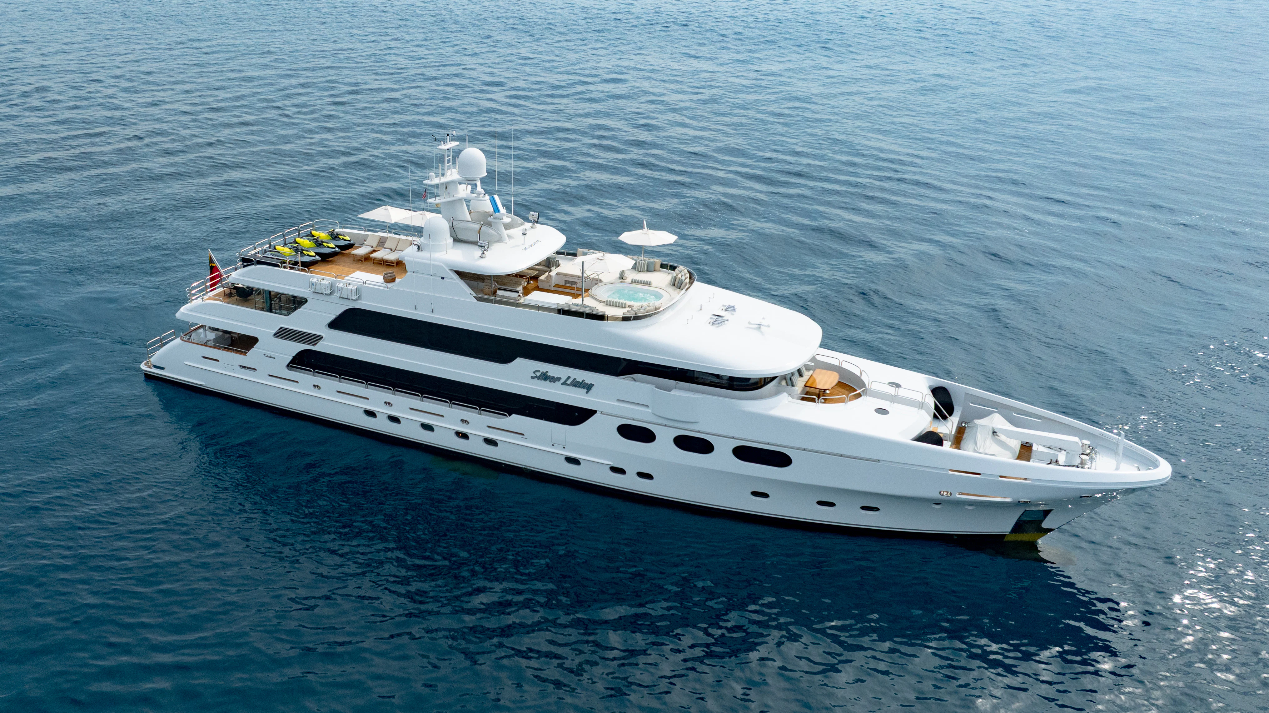 a white yacht on the water aboard SILVER LINING Yacht for Sale