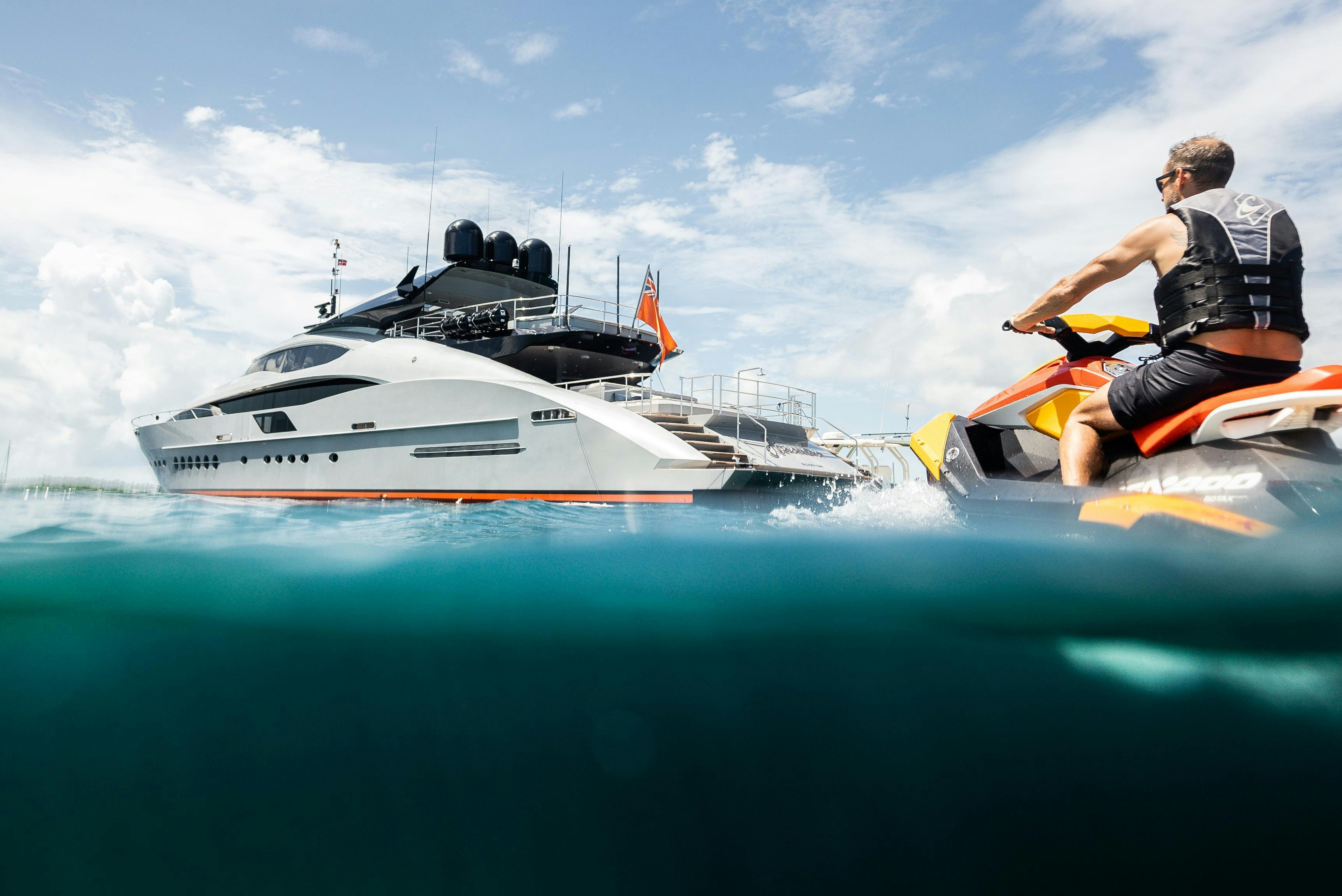 a man on a boat aboard AQUANOVA Yacht for Charter