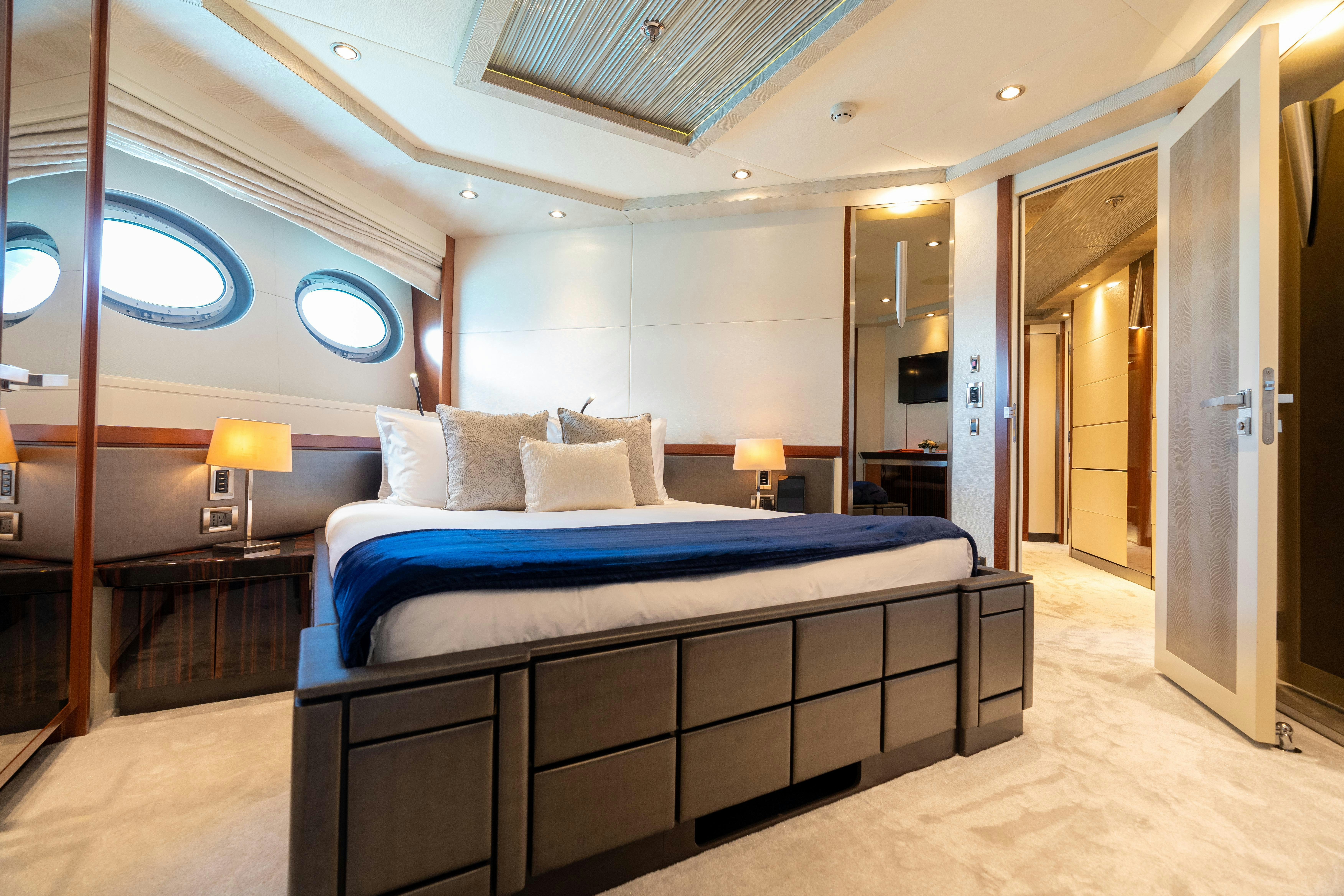 a bed in a room aboard AQUANOVA Yacht for Charter