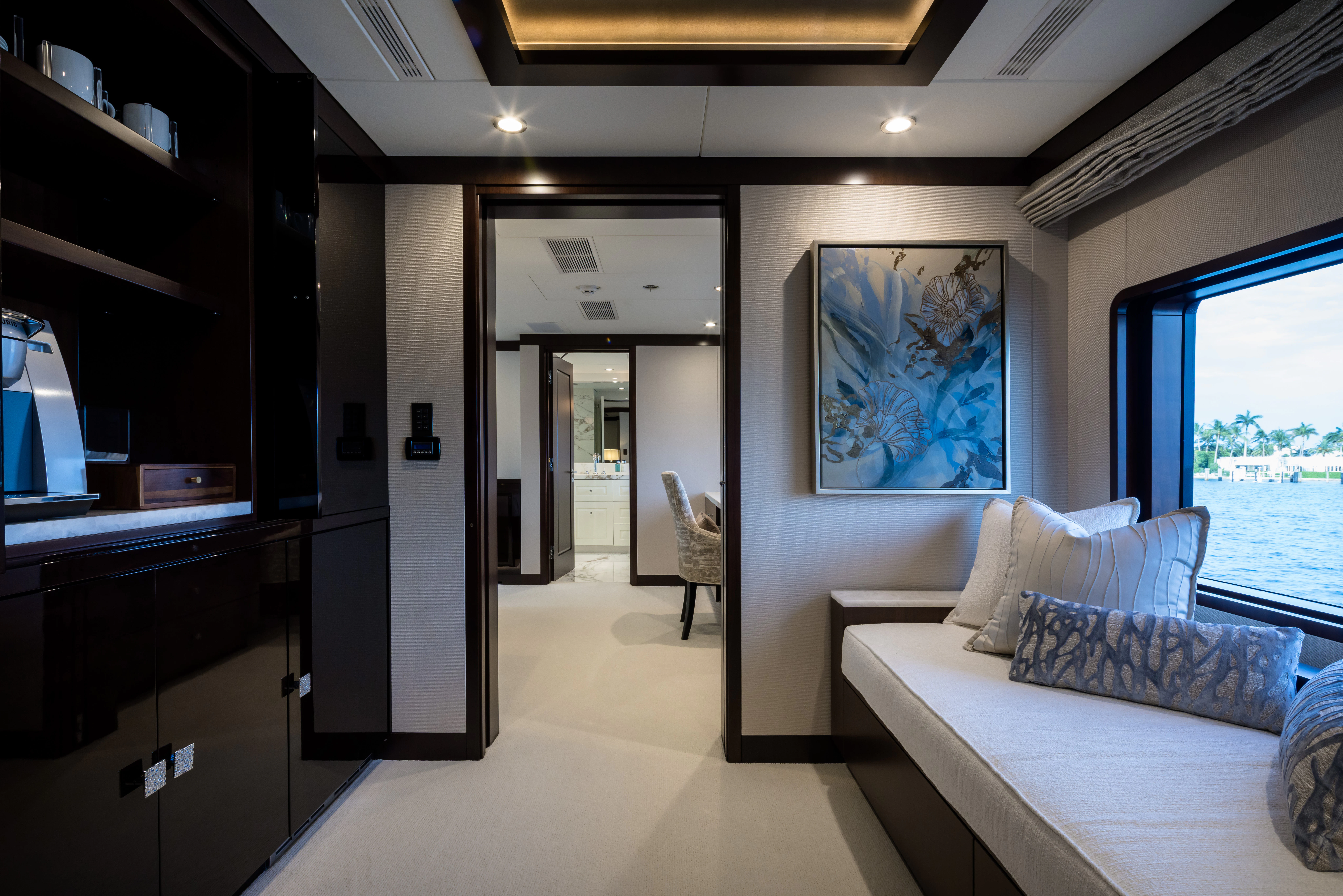 a room with a couch and a tv aboard MISS MICHELLE Yacht for Charter