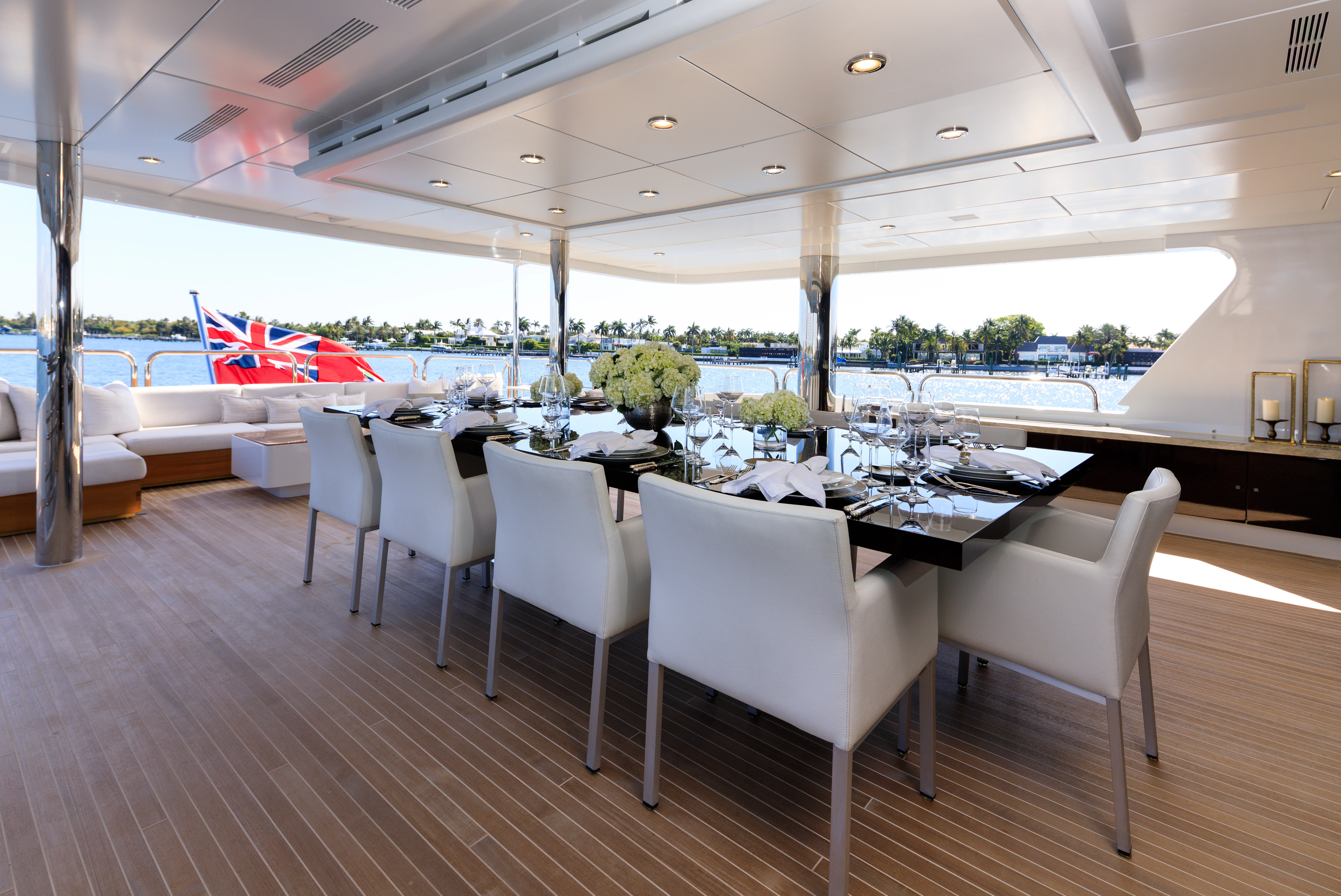 a room with tables and chairs aboard MISS MICHELLE Yacht for Charter