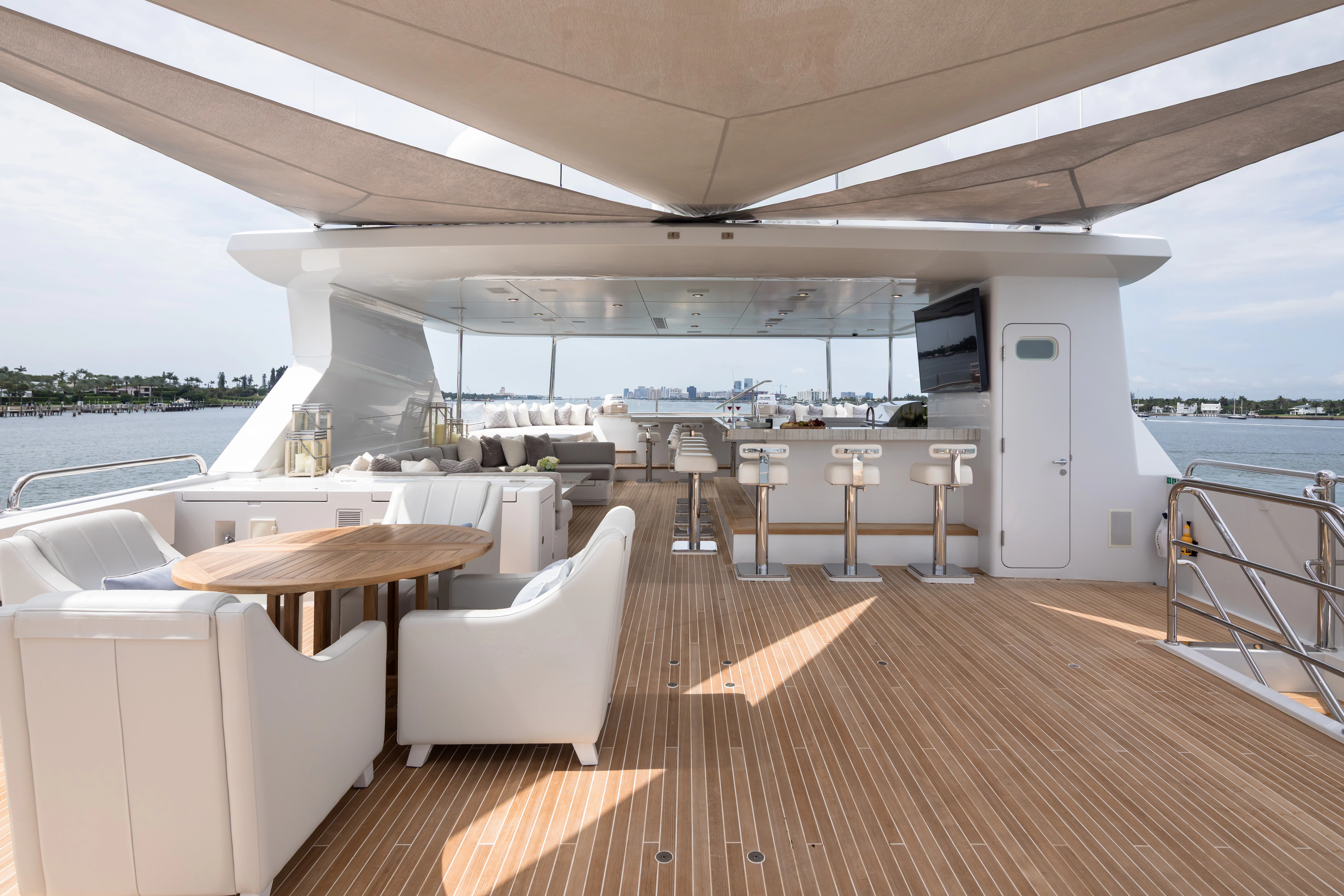 a boat dock with chairs and tables aboard MISS MICHELLE Yacht for Charter