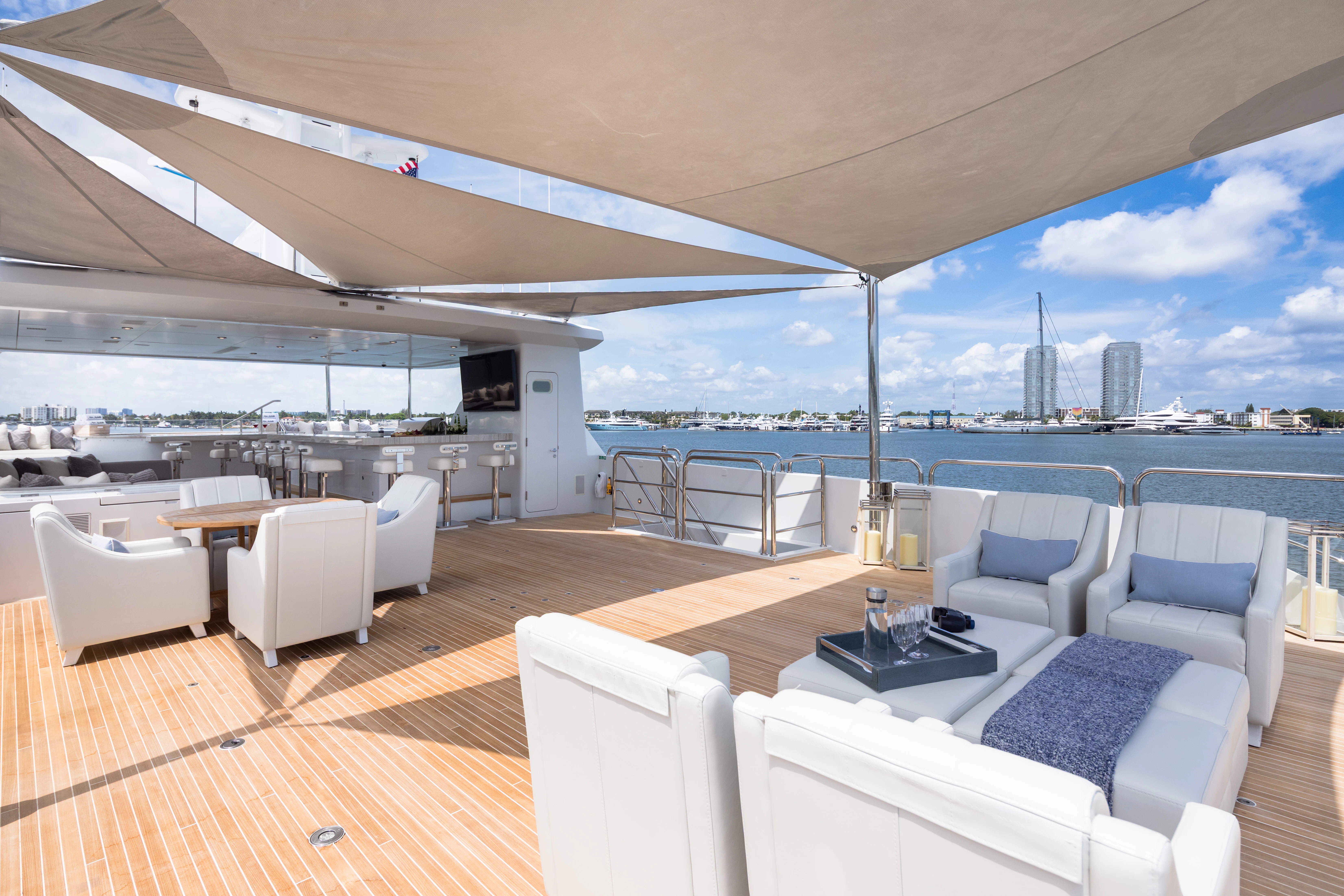 a large room with a large balcony aboard MISS MICHELLE Yacht for Charter