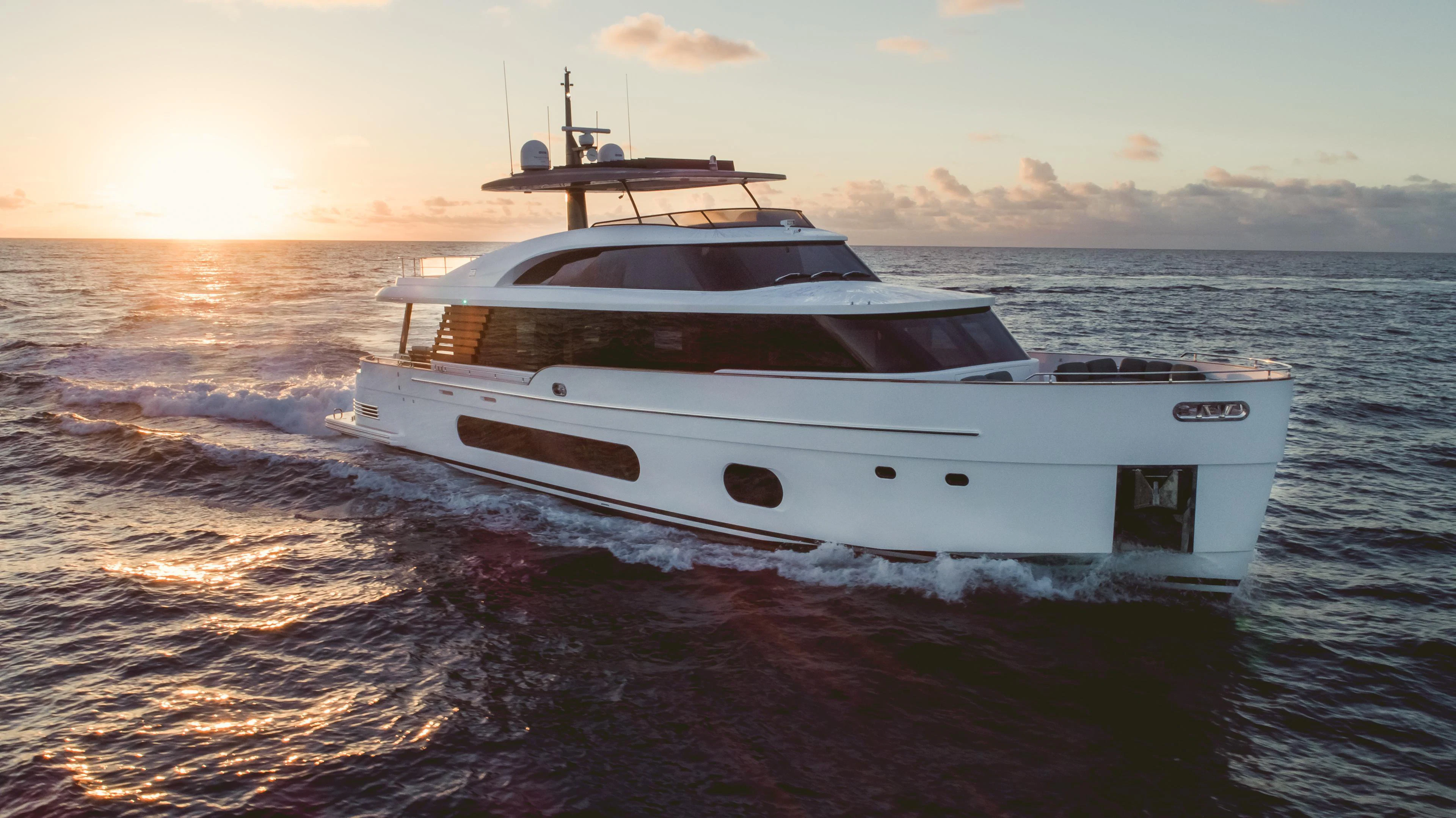 a white yacht on the water aboard GUBA TIMES Yacht for Charter