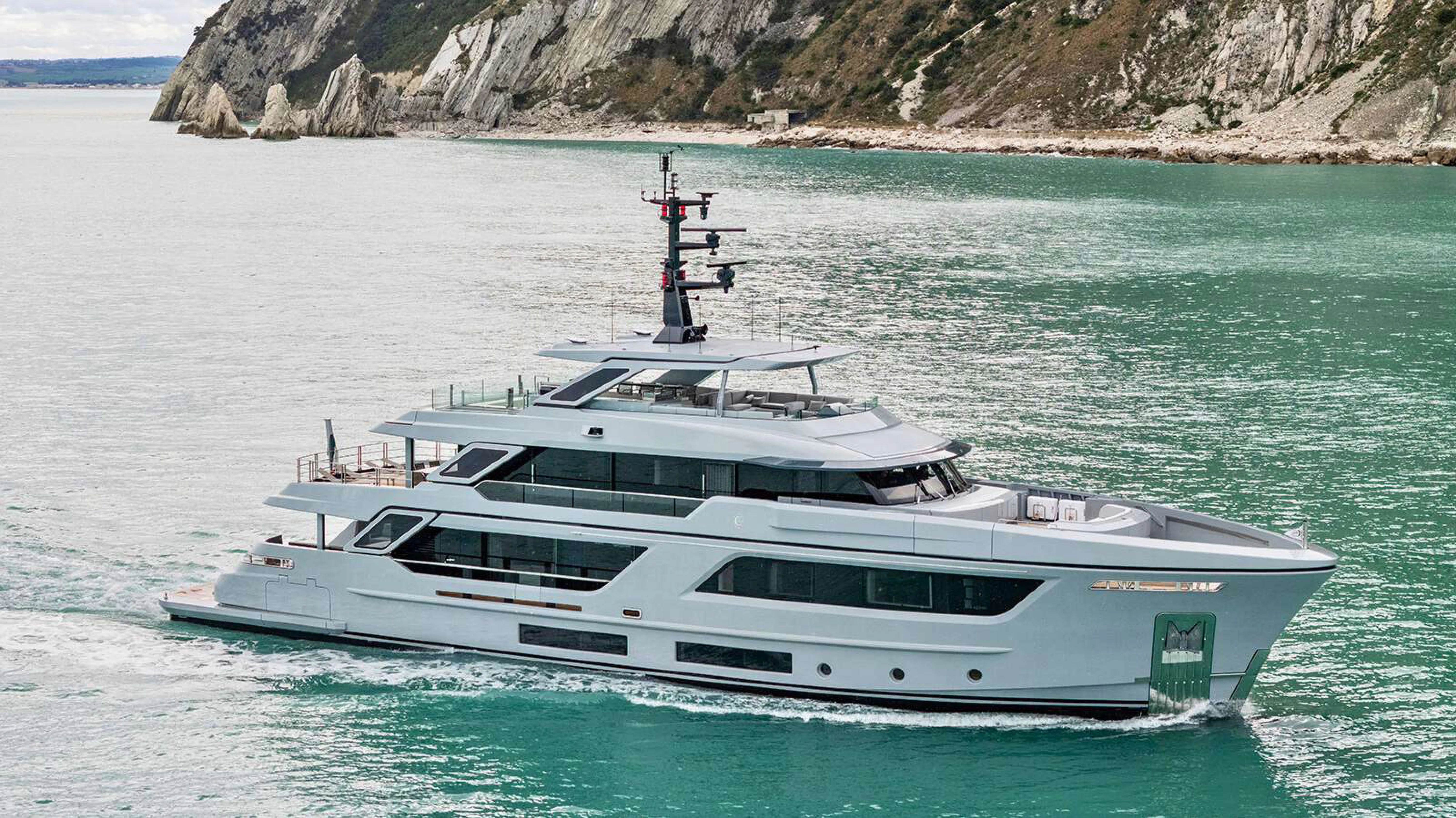 a white yacht in the water aboard PAZIENZA Yacht for Charter