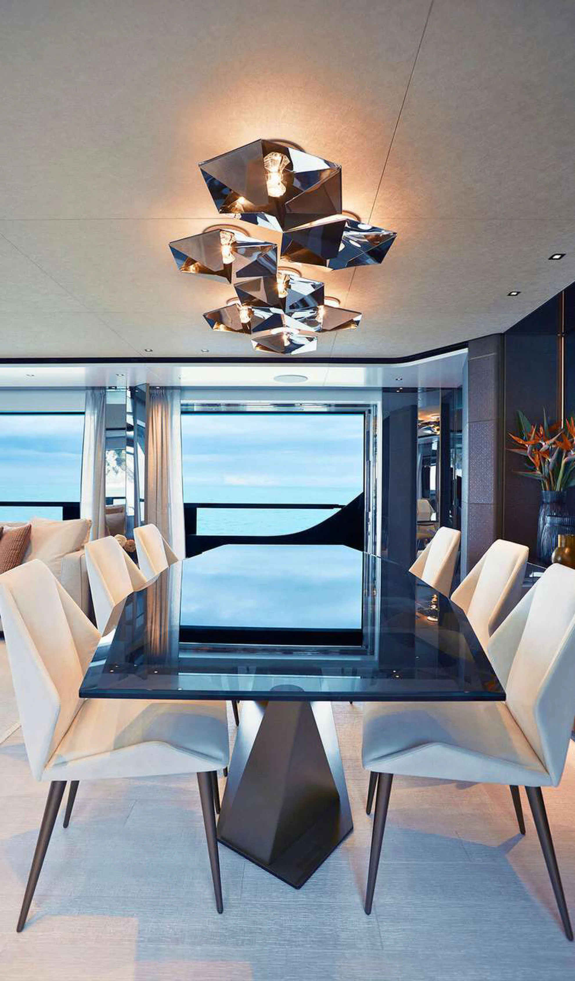 a dining table with chairs around it aboard PAZIENZA Yacht for Charter
