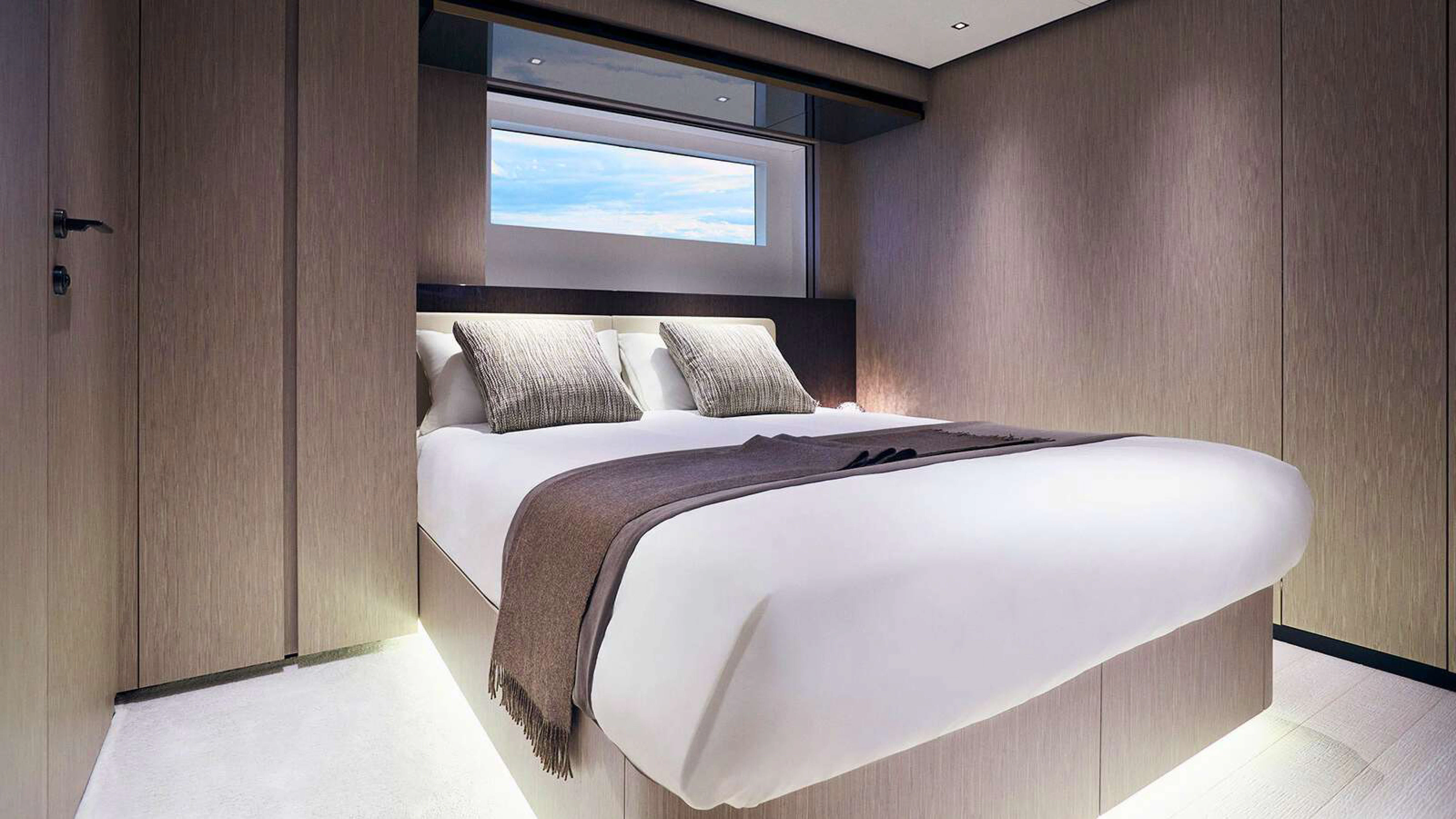 a bed in a room aboard PAZIENZA Yacht for Charter