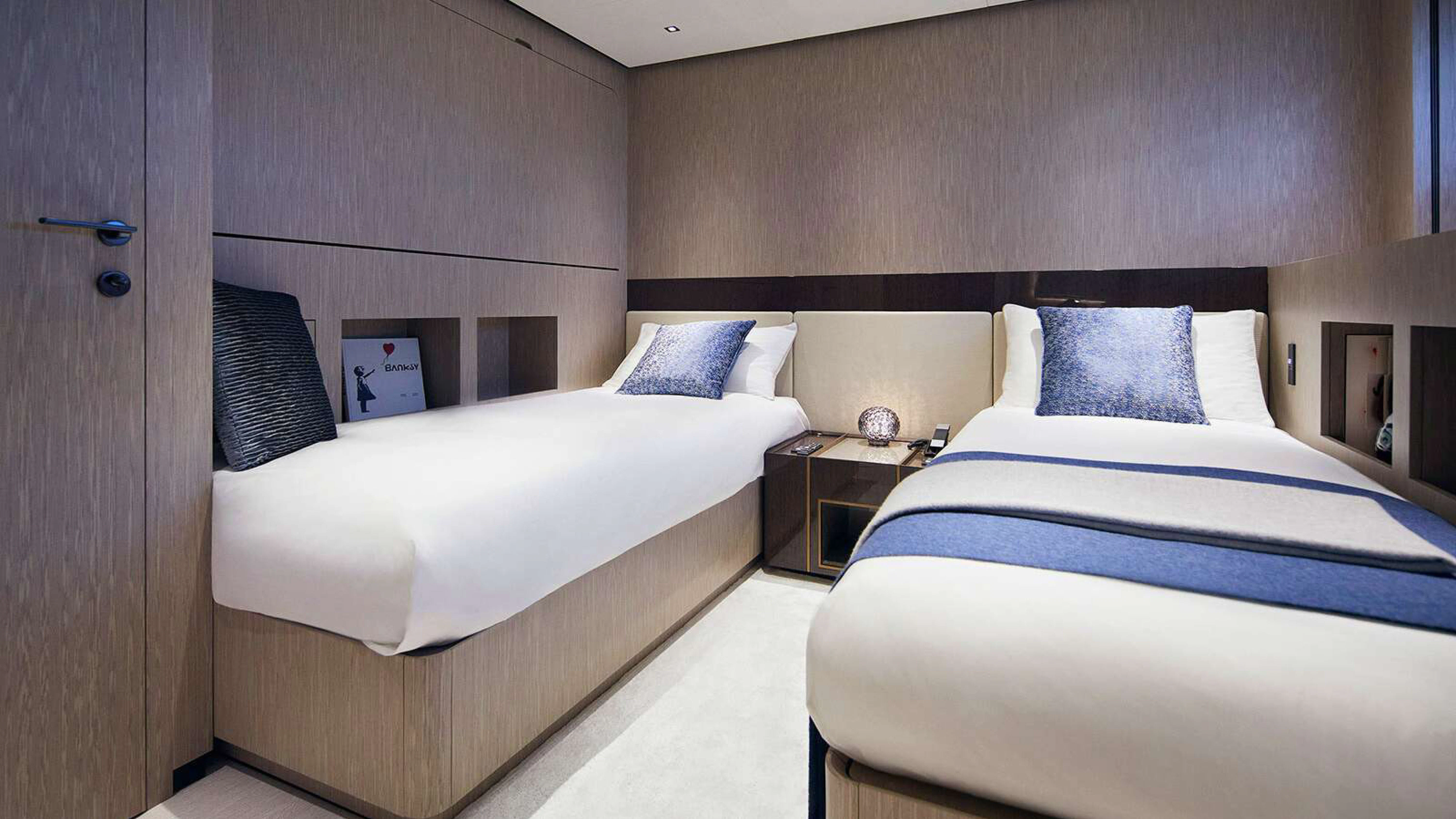 a room with two beds aboard PAZIENZA Yacht for Charter
