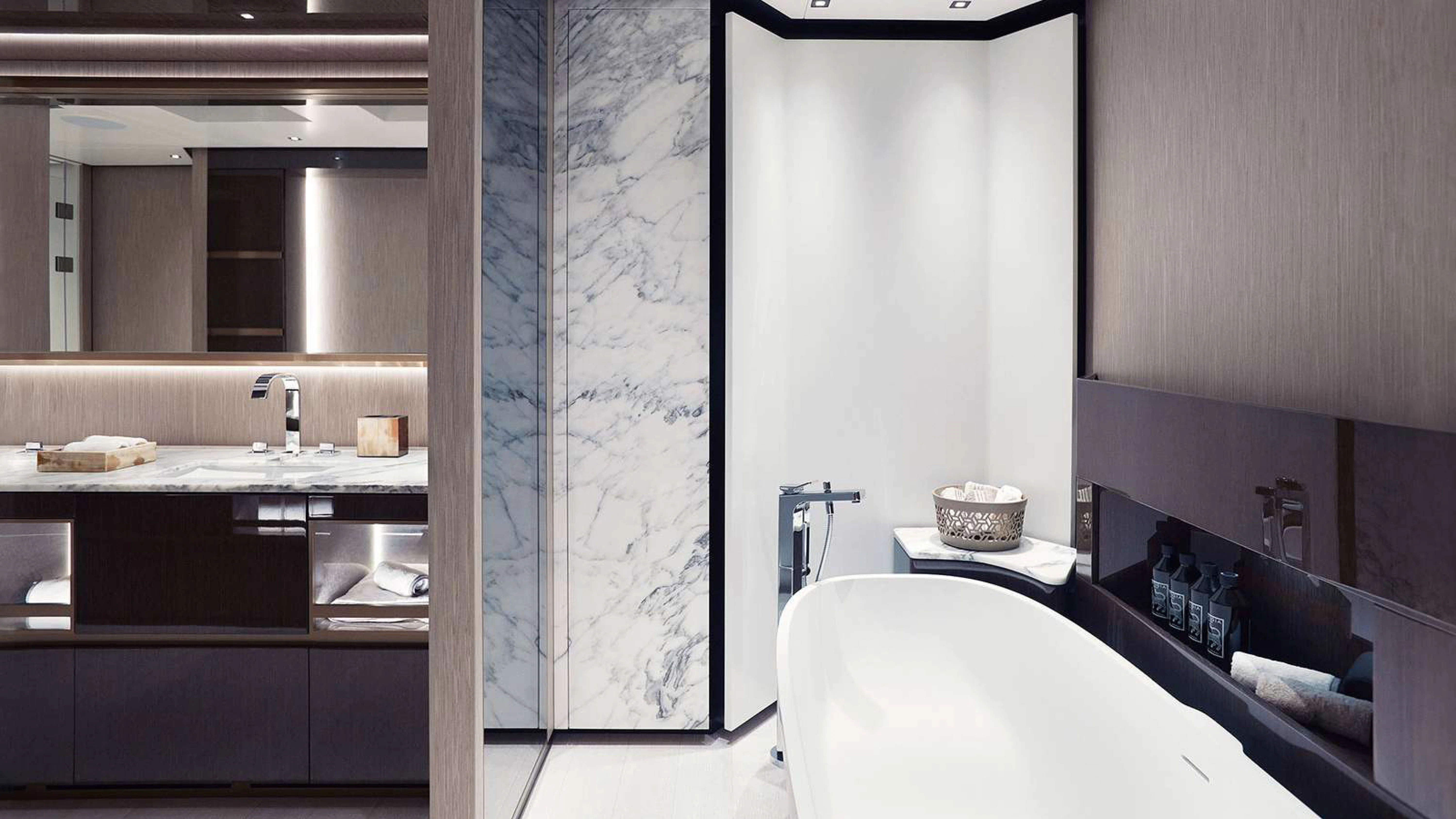 a bathroom with a shower and sink aboard PAZIENZA Yacht for Charter