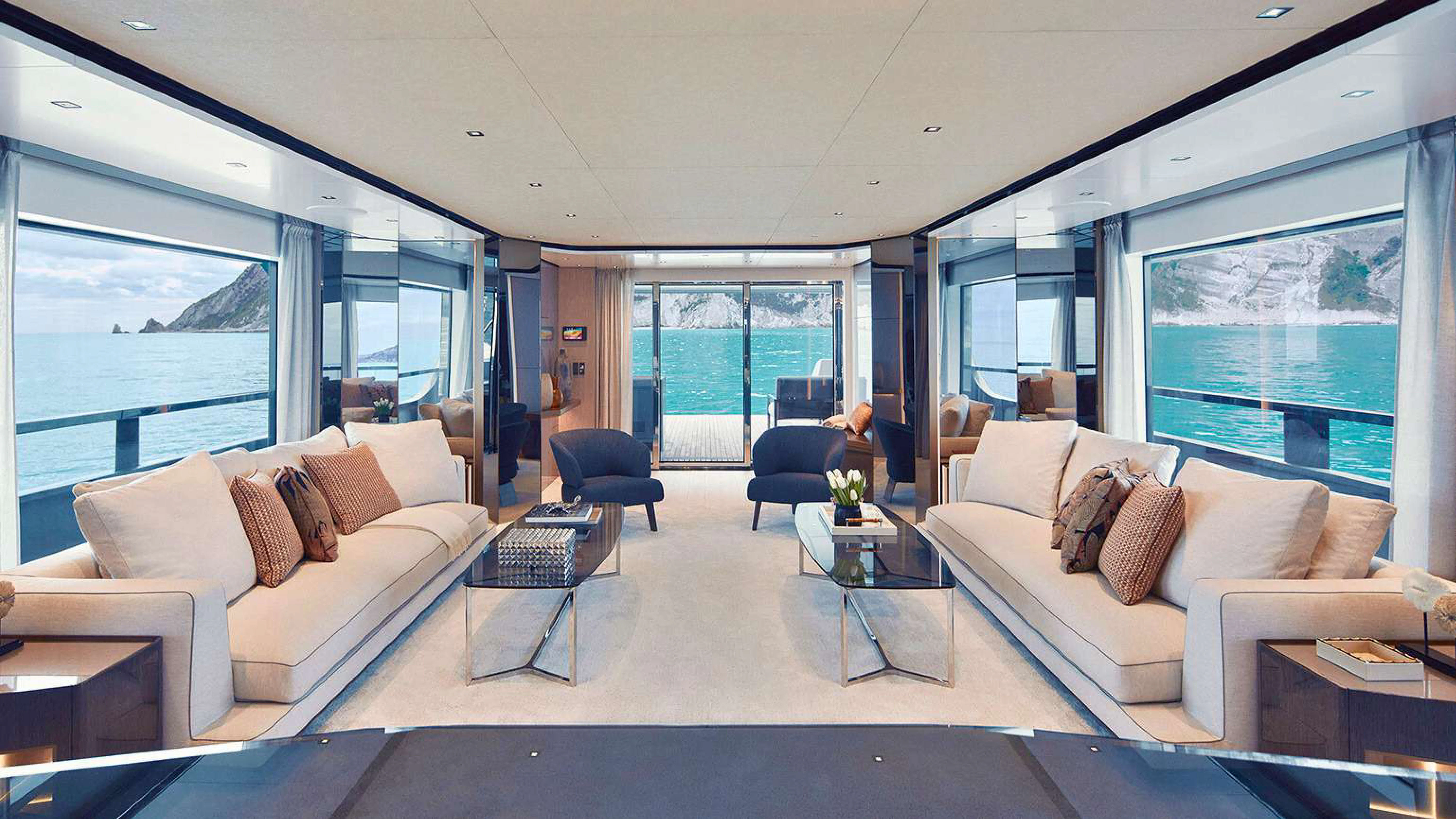 a living room with a couch and a table aboard PAZIENZA Yacht for Charter