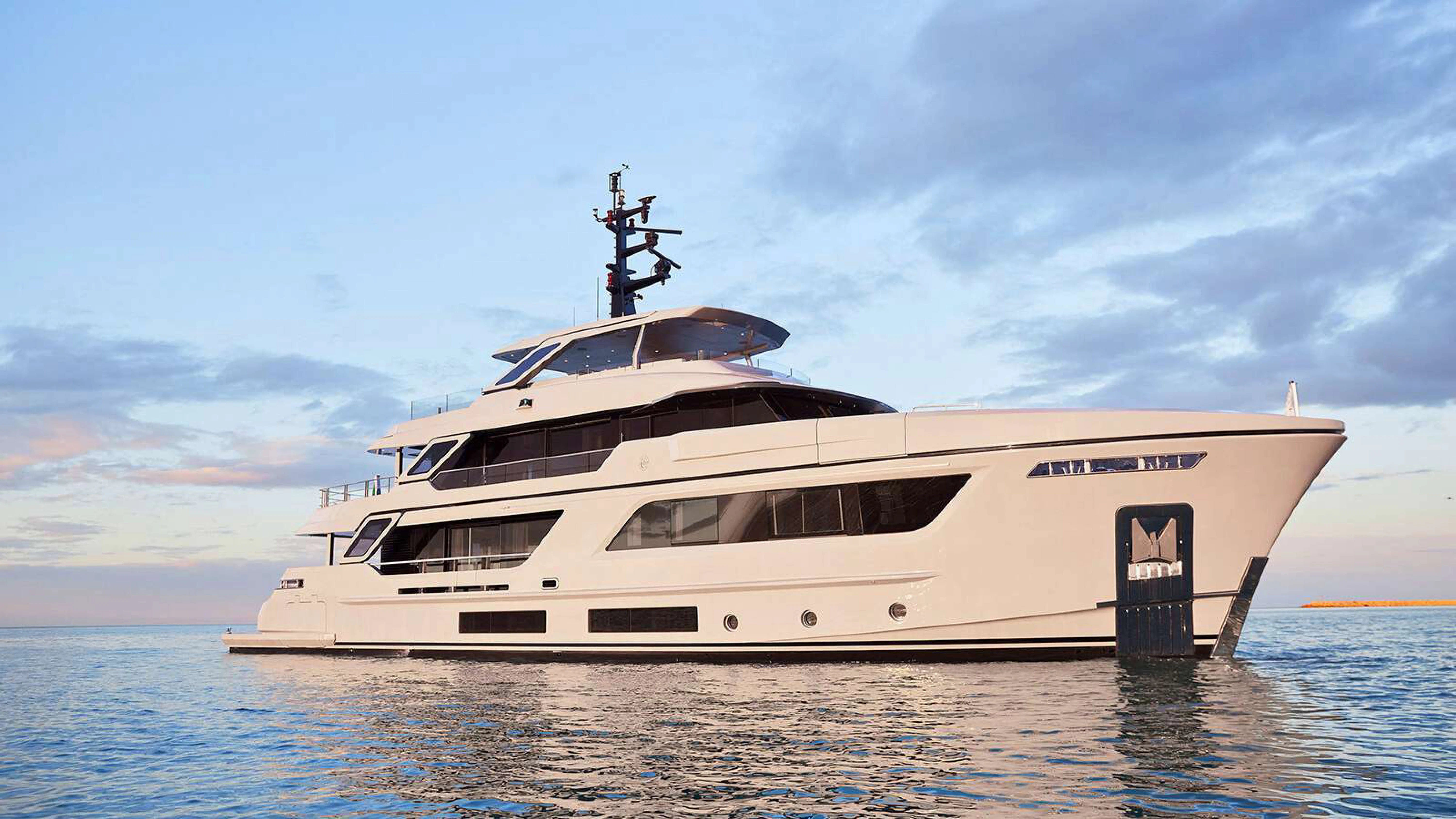 a white yacht on the water aboard PAZIENZA Yacht for Charter