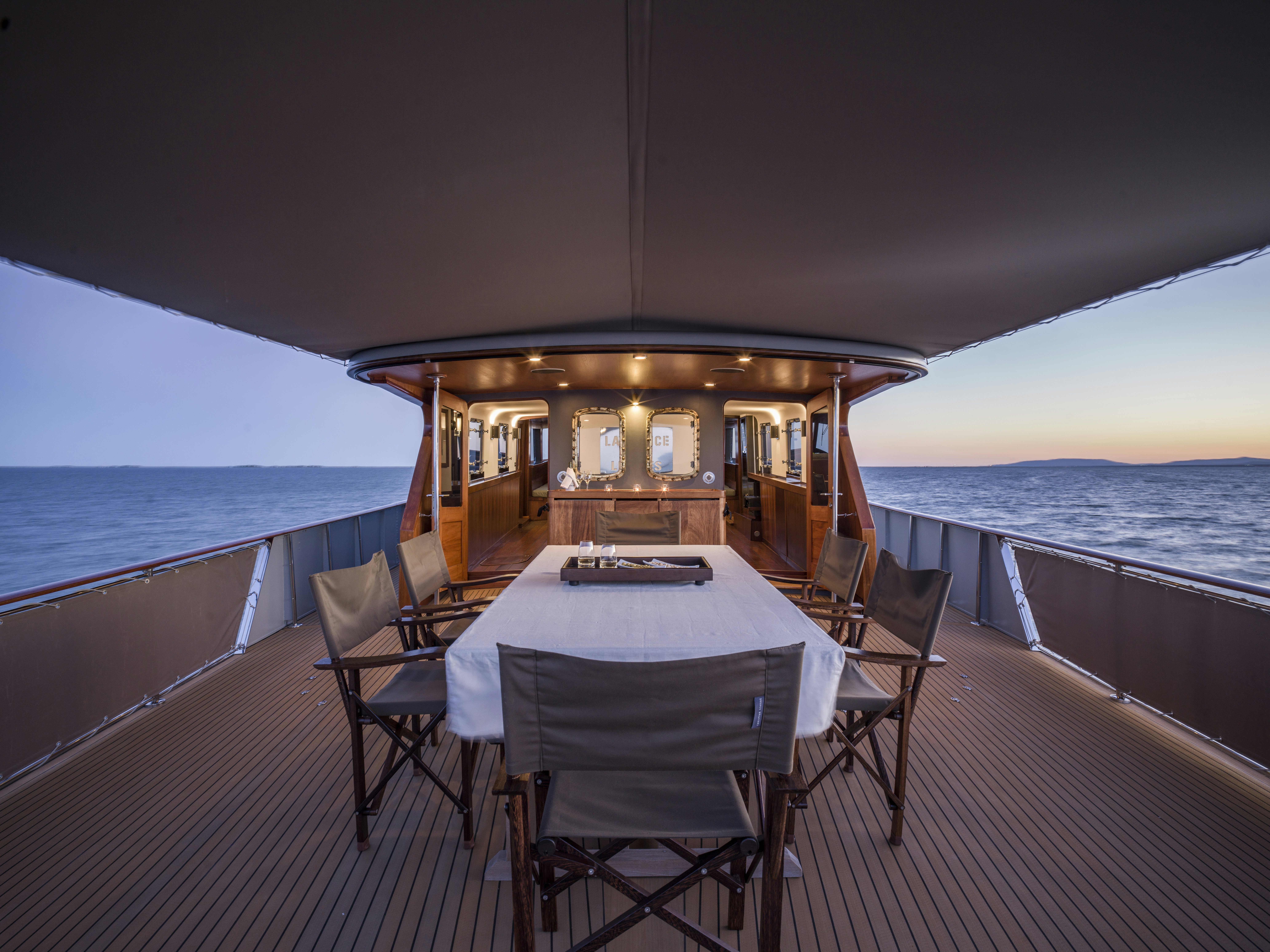 a table on a boat aboard LA FENICE Yacht for Sale