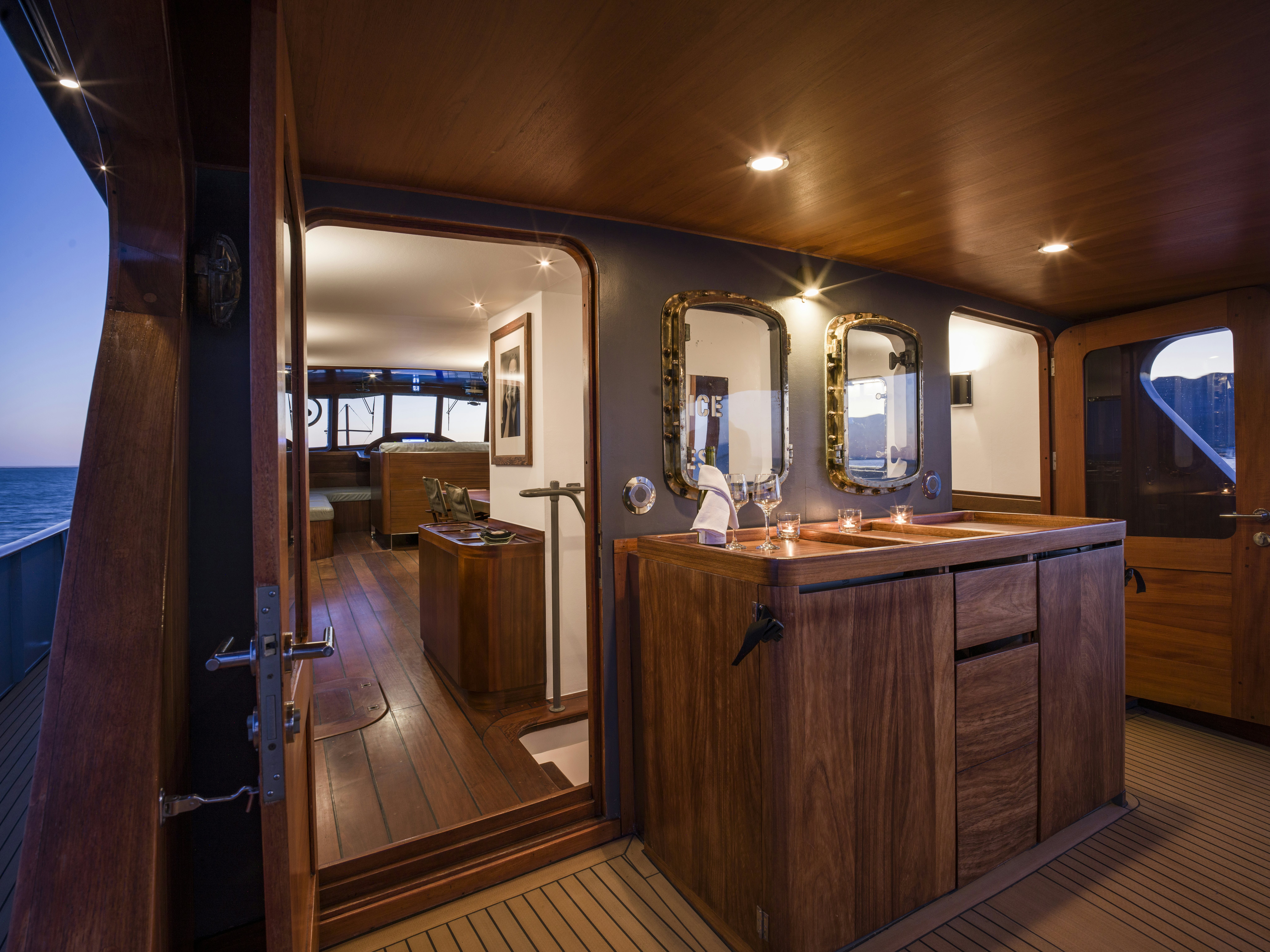 a bathroom with a wood floor aboard LA FENICE Yacht for Sale