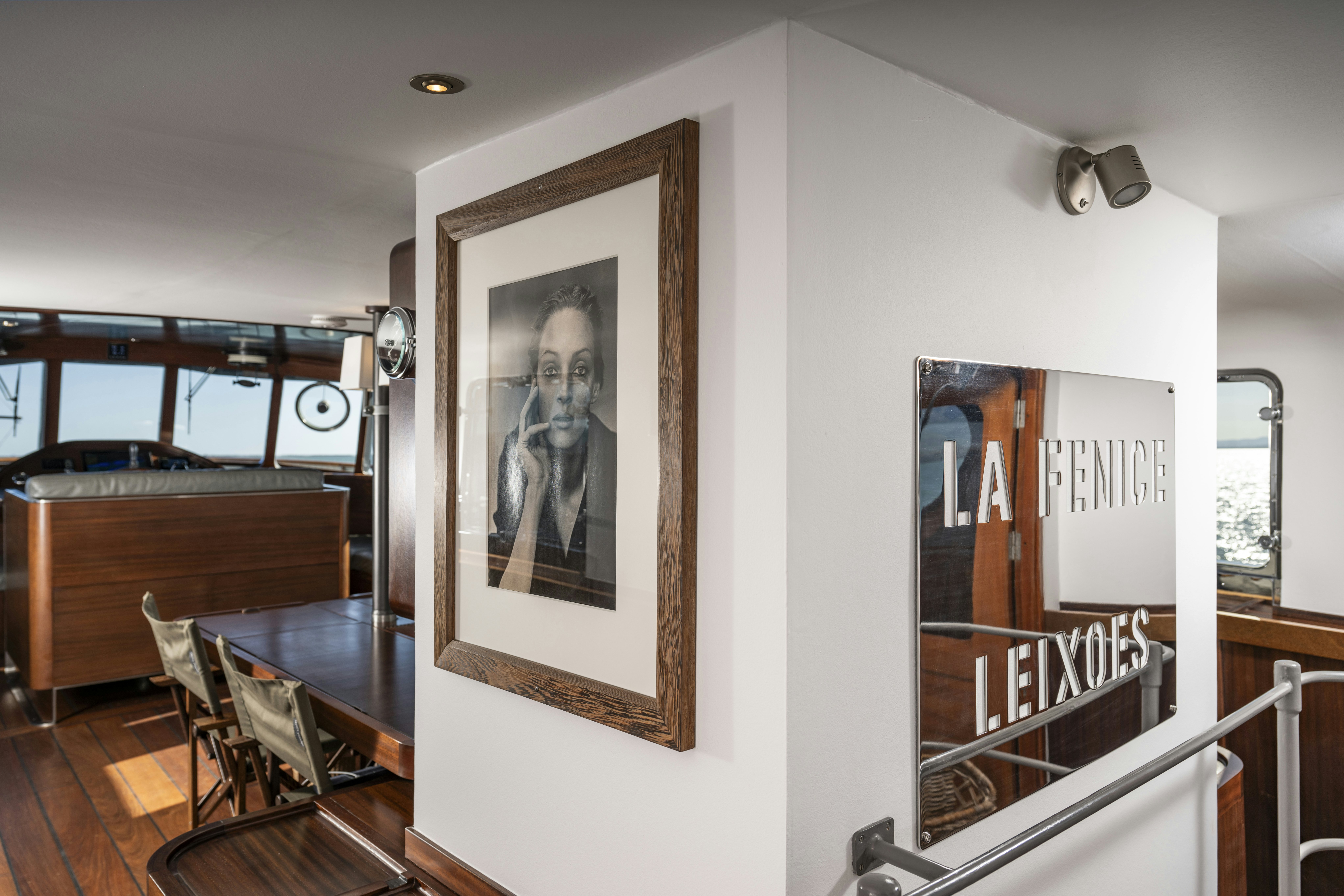 a room with a painting on the wall aboard LA FENICE Yacht for Sale