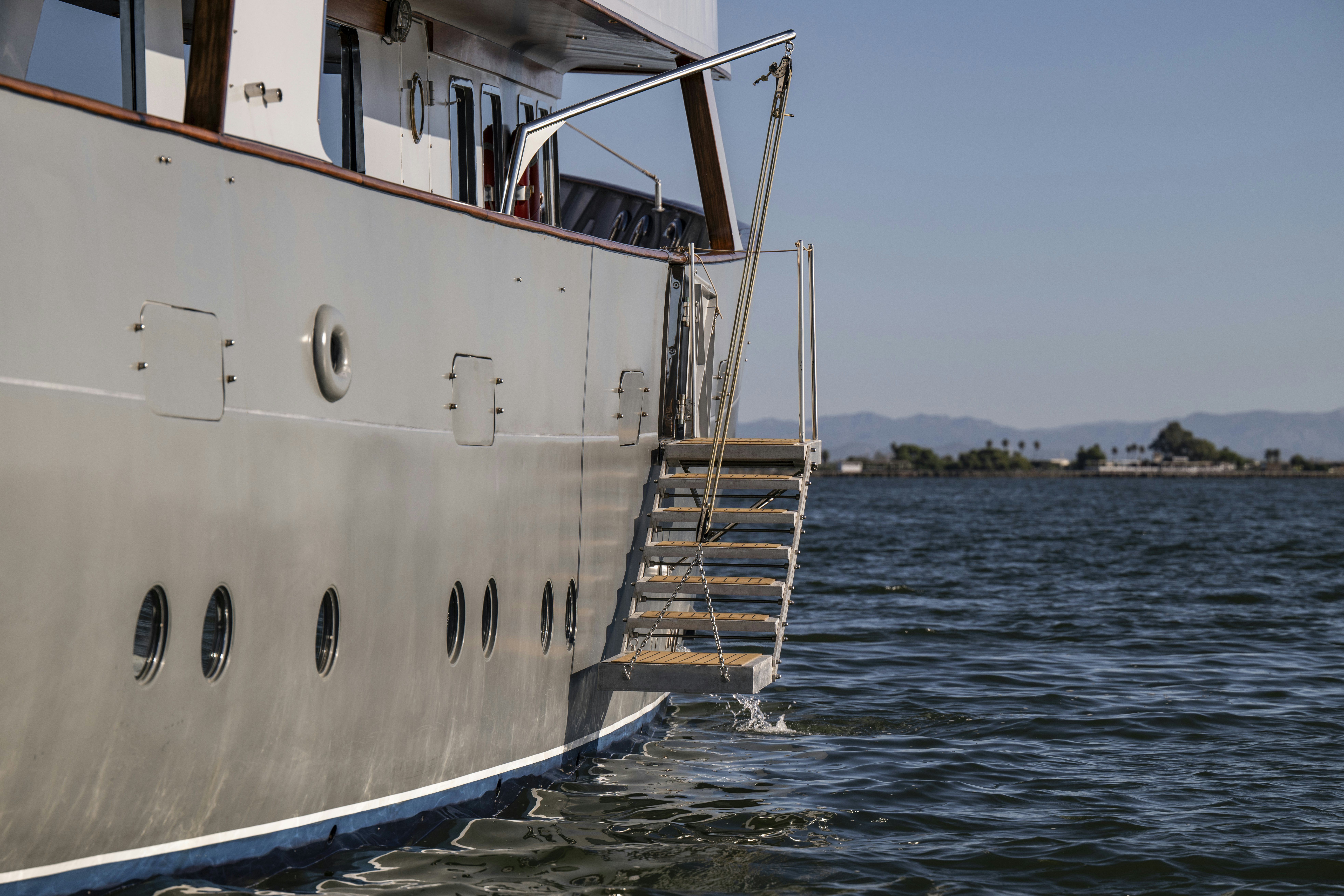 a large white boat in the water aboard LA FENICE Yacht for Sale